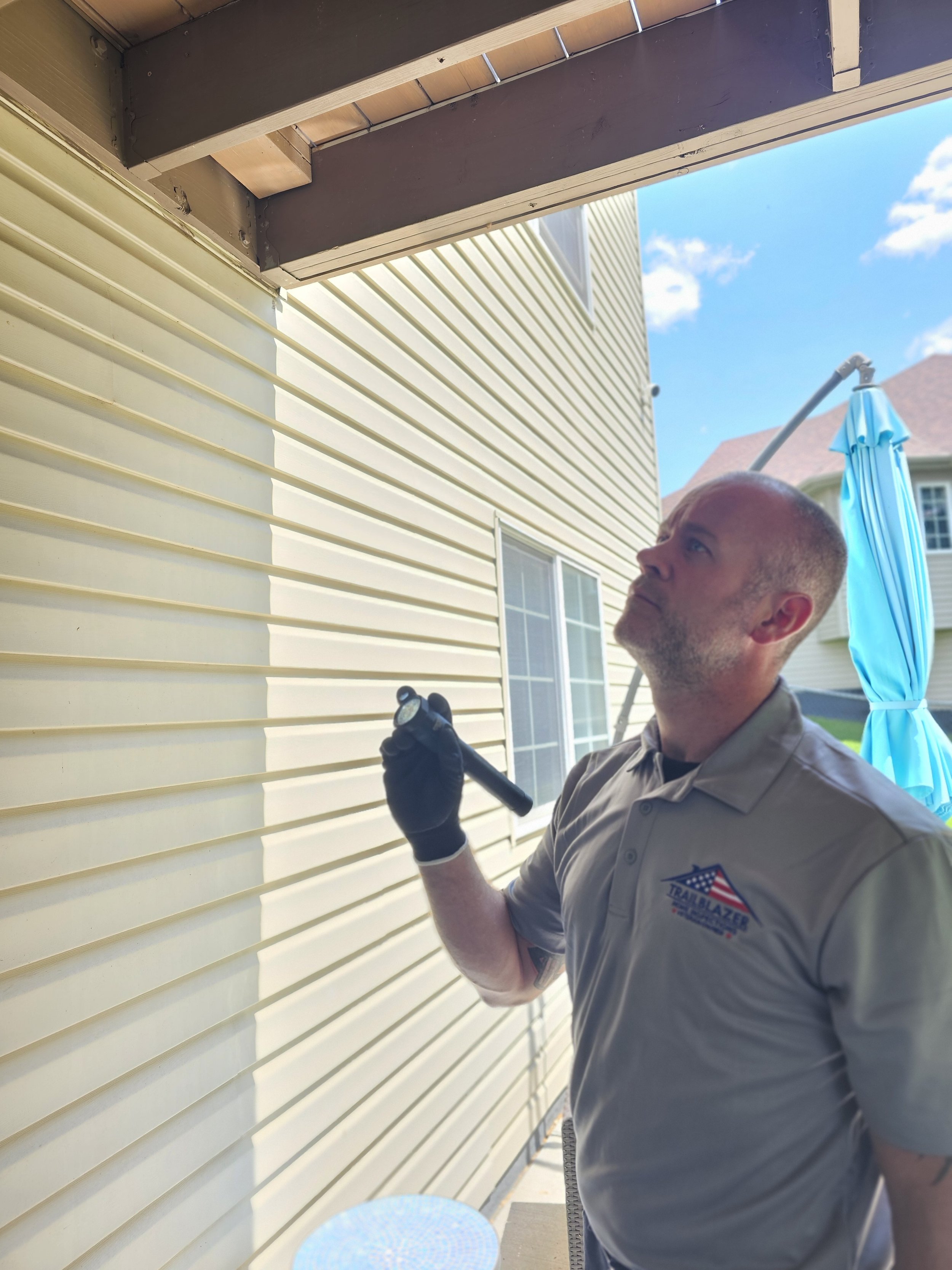 Inspector Checking under a deck in Mn