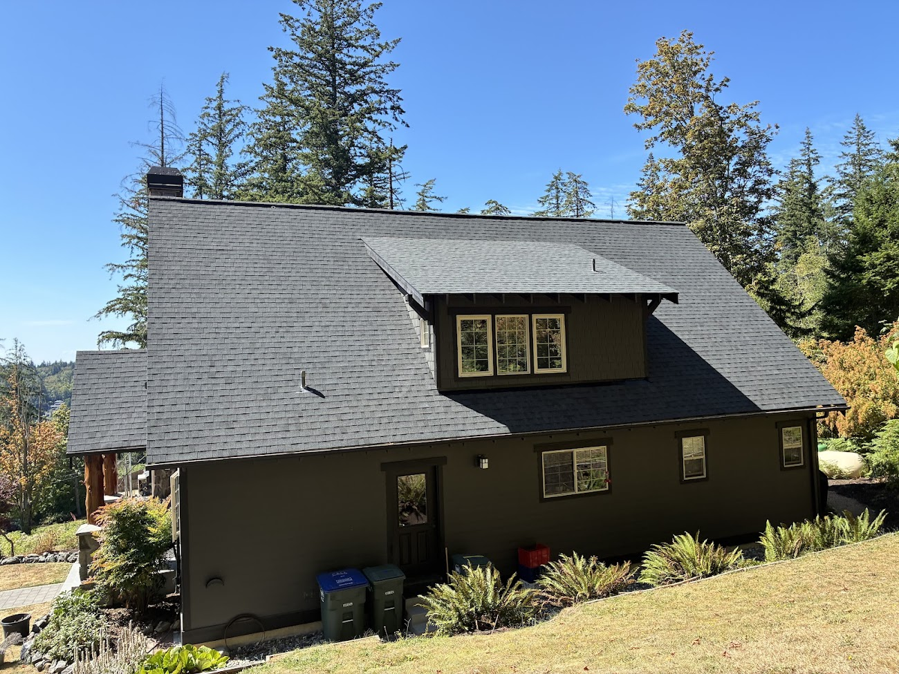 Shingle roof with dormer replaced by Topside