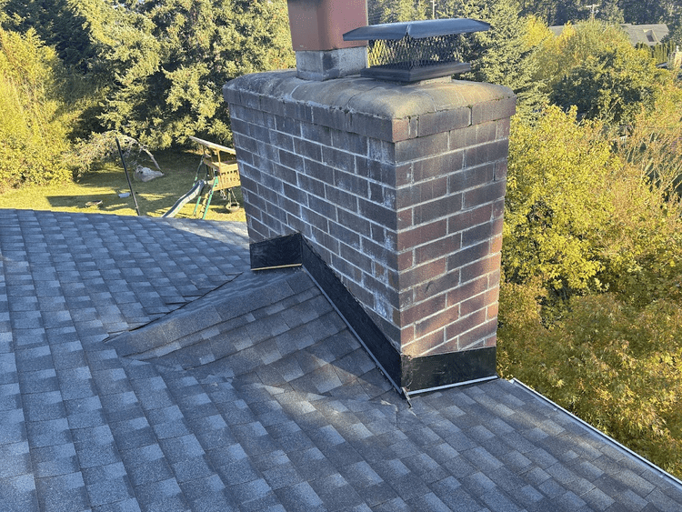 New chimney flashing on a Topside shingle roof