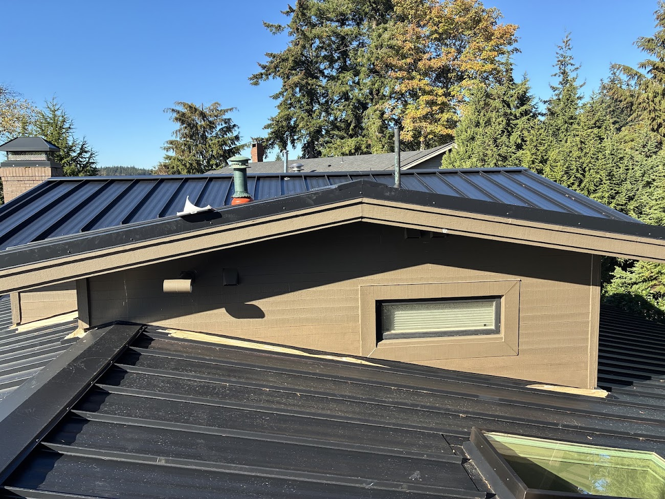 Metal roof on a home finished by Topside