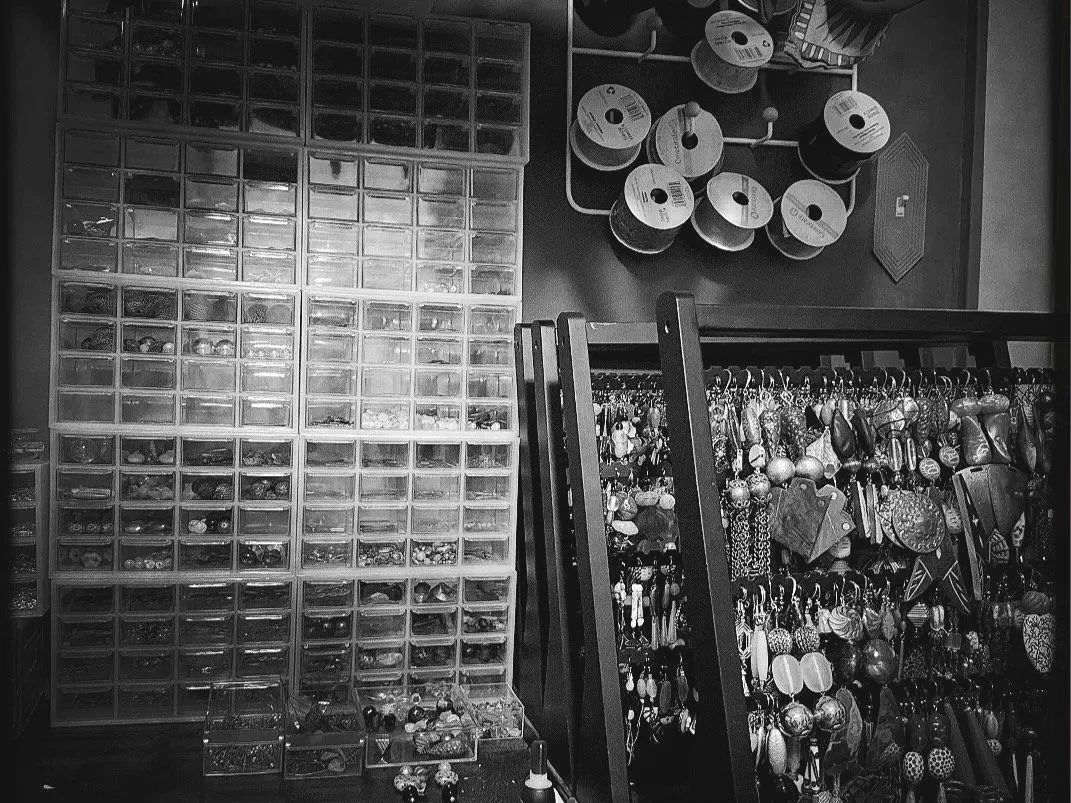 Inside Gilded Riot Studio, vintage jewelry, salvaged materials, beads, feathers, and unexpected finds are transformed into one-of-a-kind handmade earrings, statement jewelry, and fascinators.