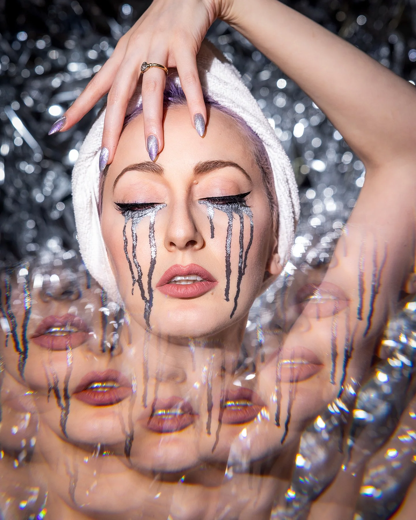 Beauty portrait with prism reflections creating layered visual effect