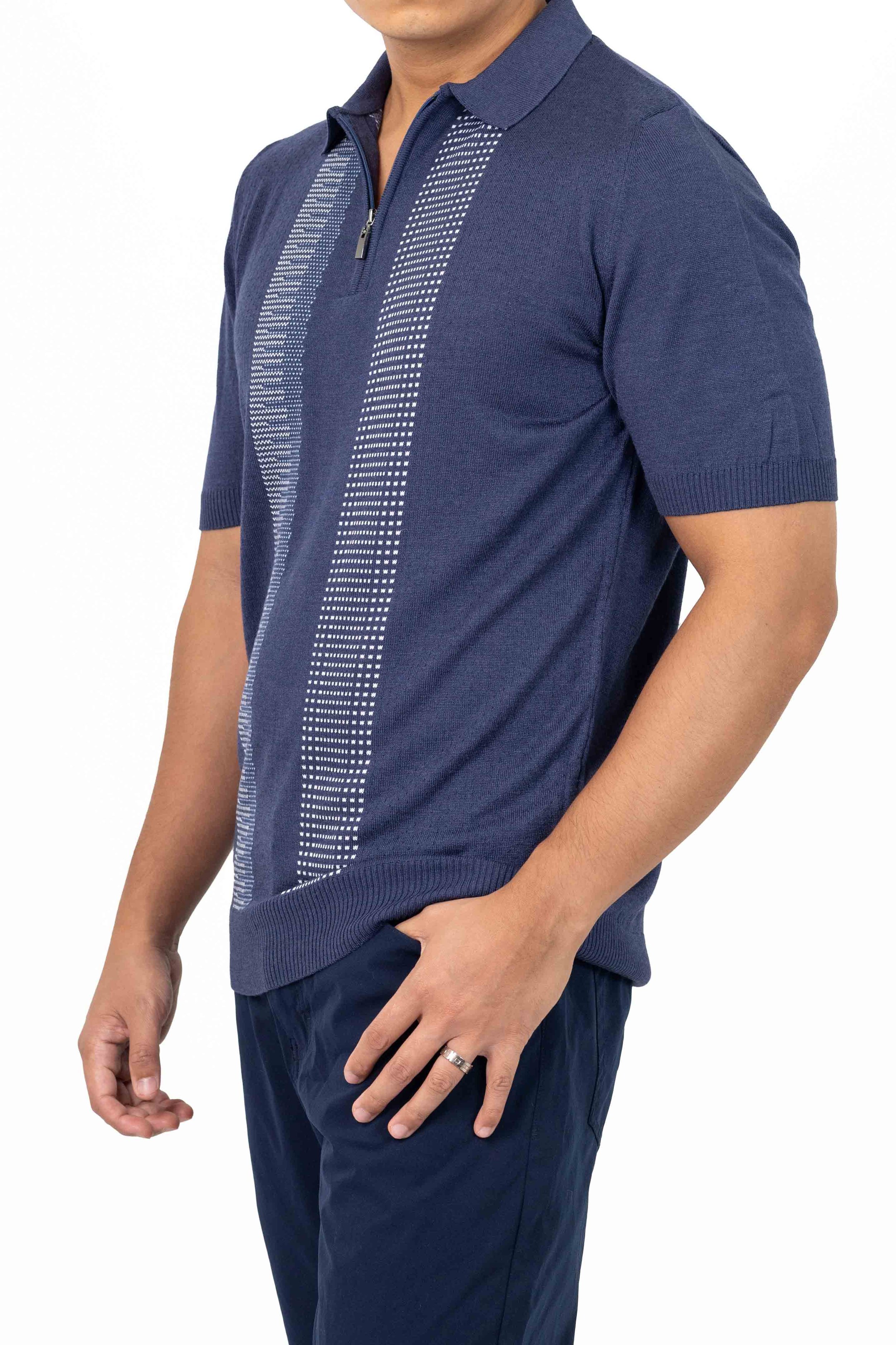Man wearing a navy short-sleeve knit shirt with a vertical pattern and a half-zip collar, paired with navy pants. Catalogue Photography. Photographed by Anna Meshcheri