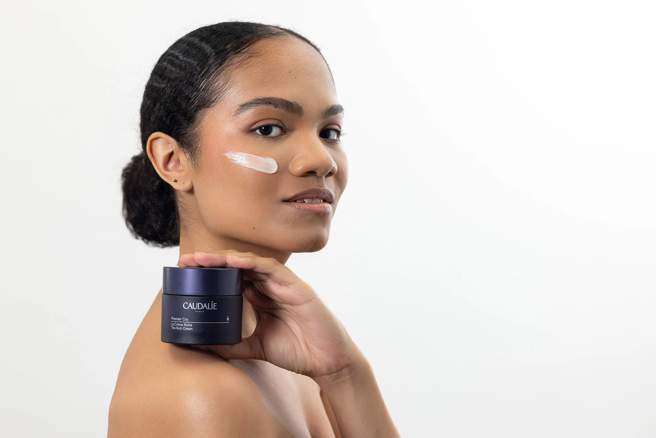 A clean and modern studio photoshoot in New York City created for a skincare brand’s face cream campaign. Featuring a natural beauty look, the model’s glowing skin takes center stage, highlighting the product’s benefits of hydration and radiance. Sho