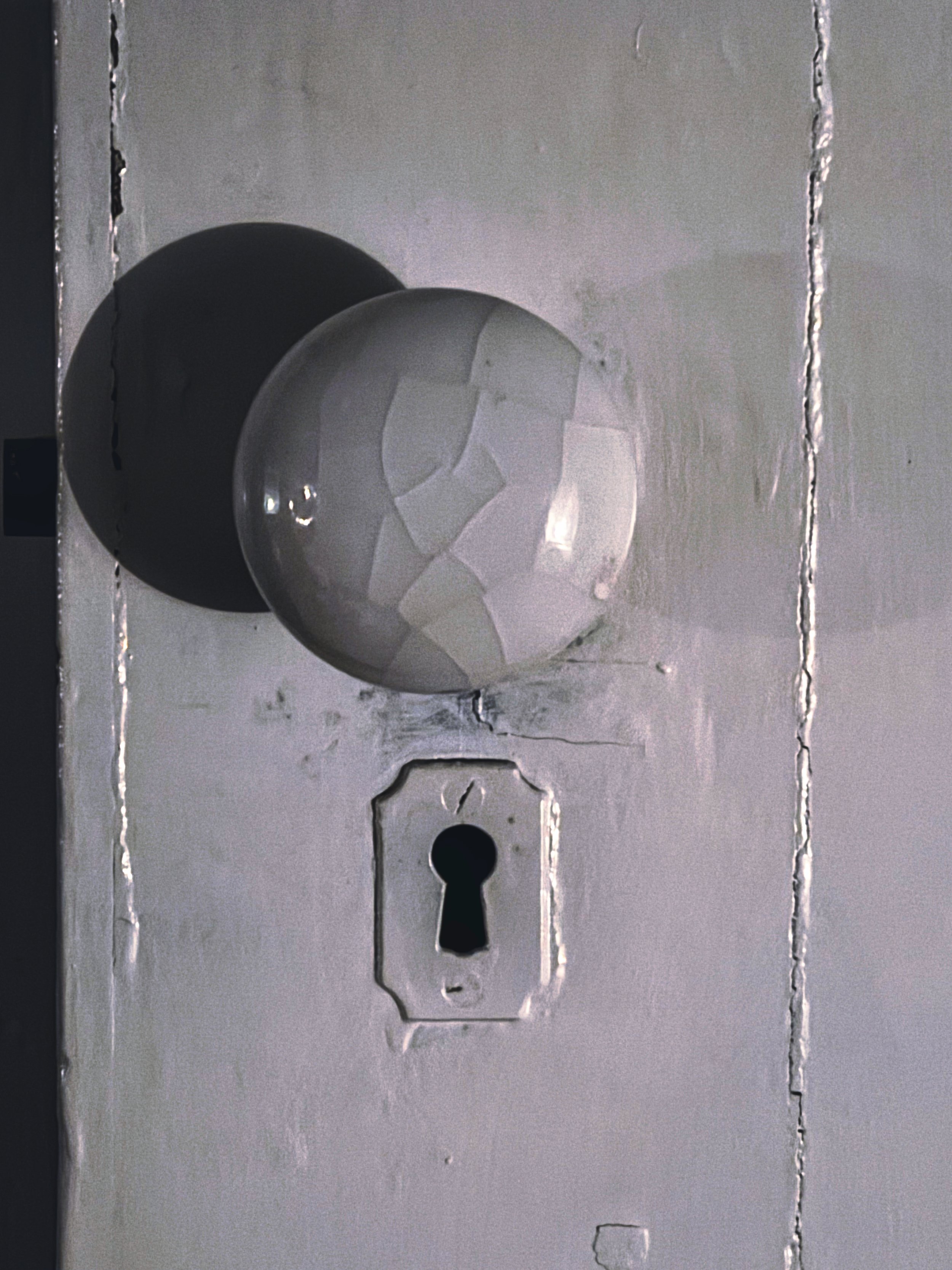 Original keyhole on centuries‑old door in haunted rental.jpg