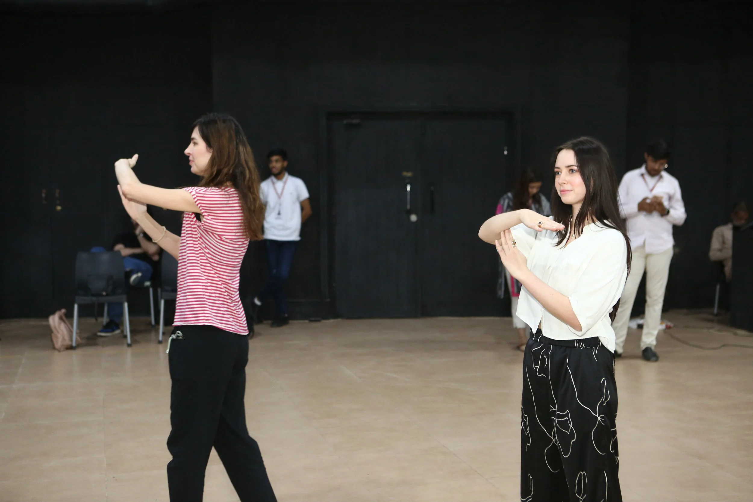 Hannah DiBella and Bonnie J. Evans host an acting workshop in Karachi, Pakistan, October 2024