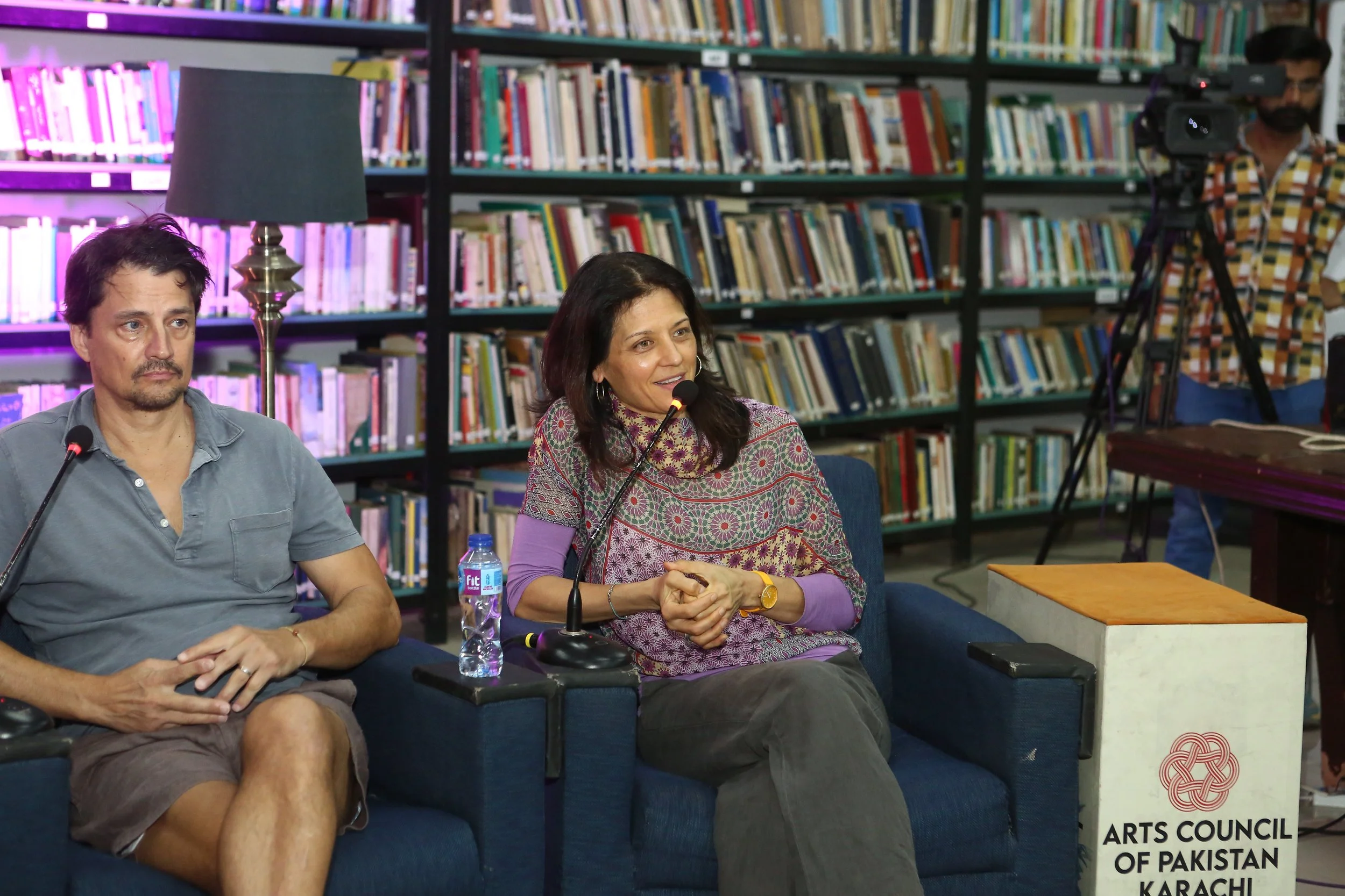 Alex Liu and Erica Lauren Wise sit on a panel in Karachi, Pakistan, October 2024