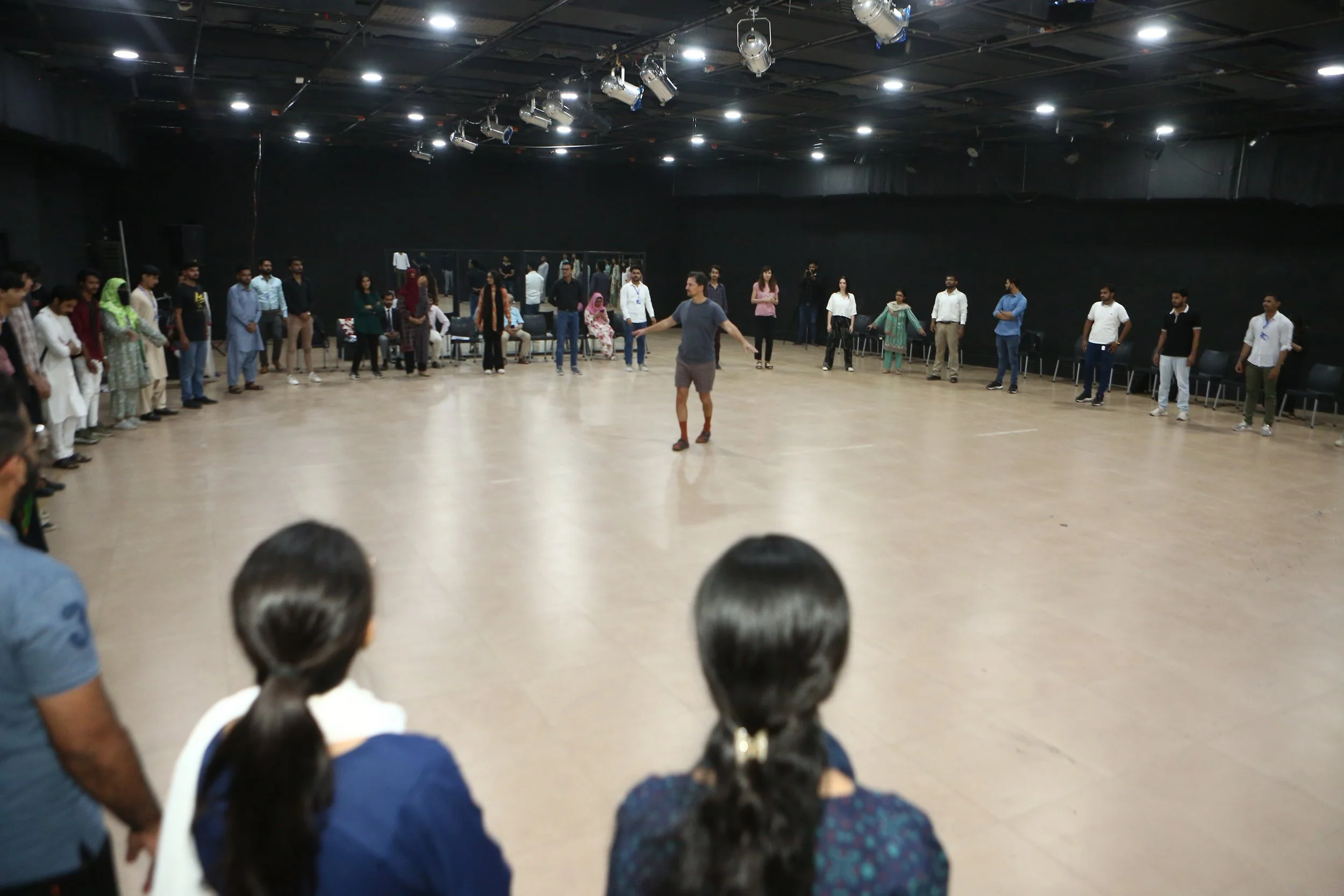 Alex Liu runs an acting workshop in Karachi, Pakistan, October 2024