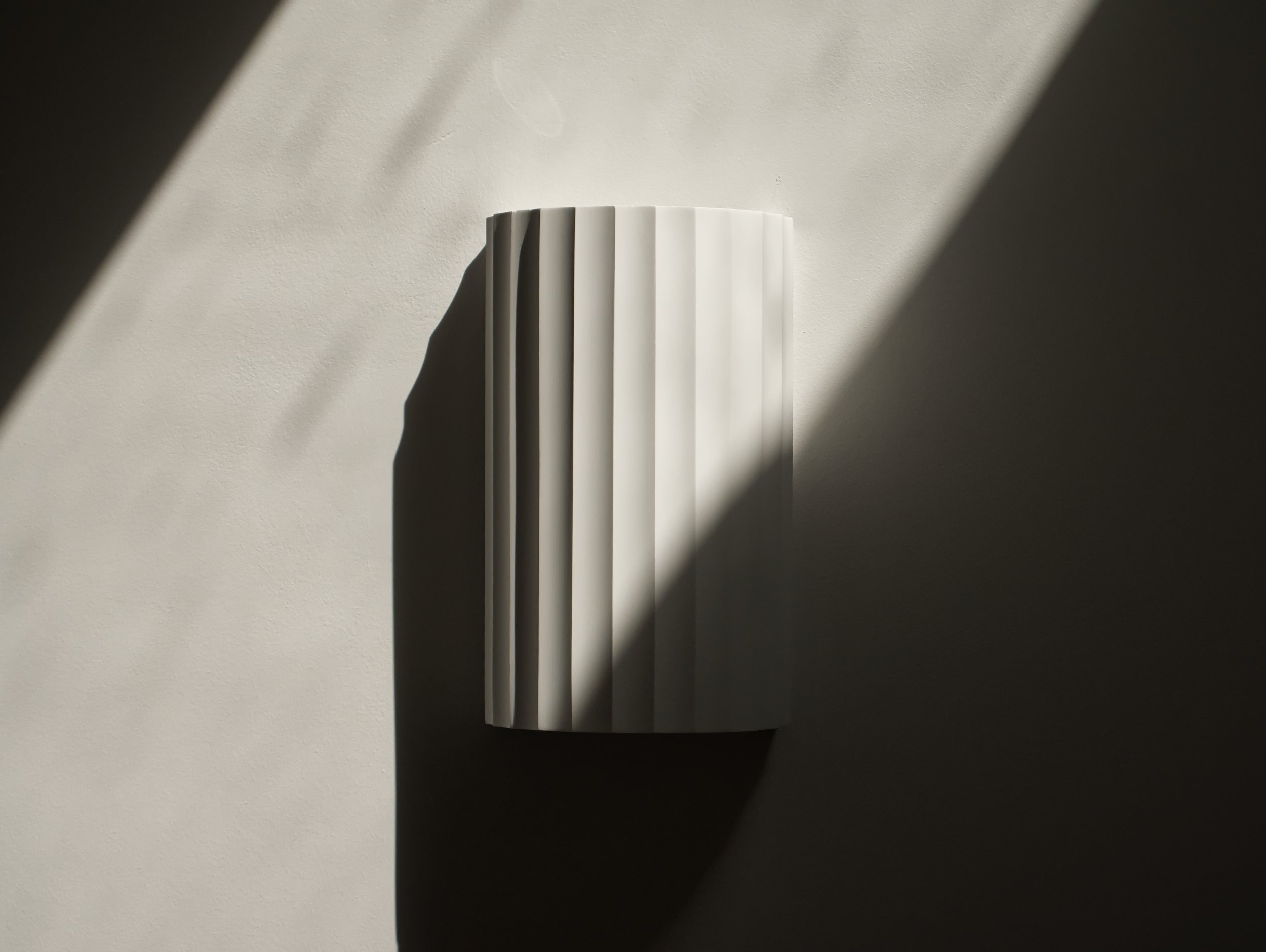 Wall light with shadow from a rooflight