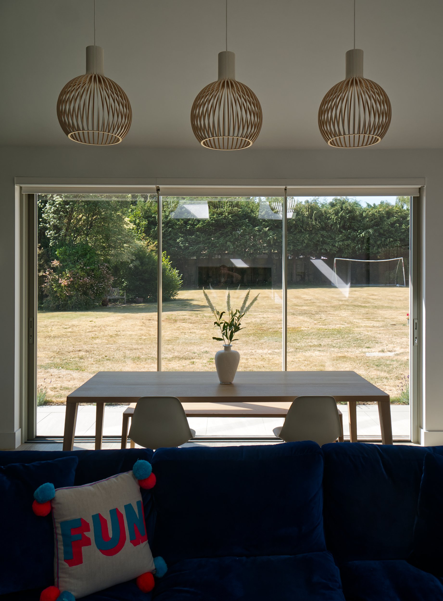Sliding doors in RAL7032 with thin glazing bars