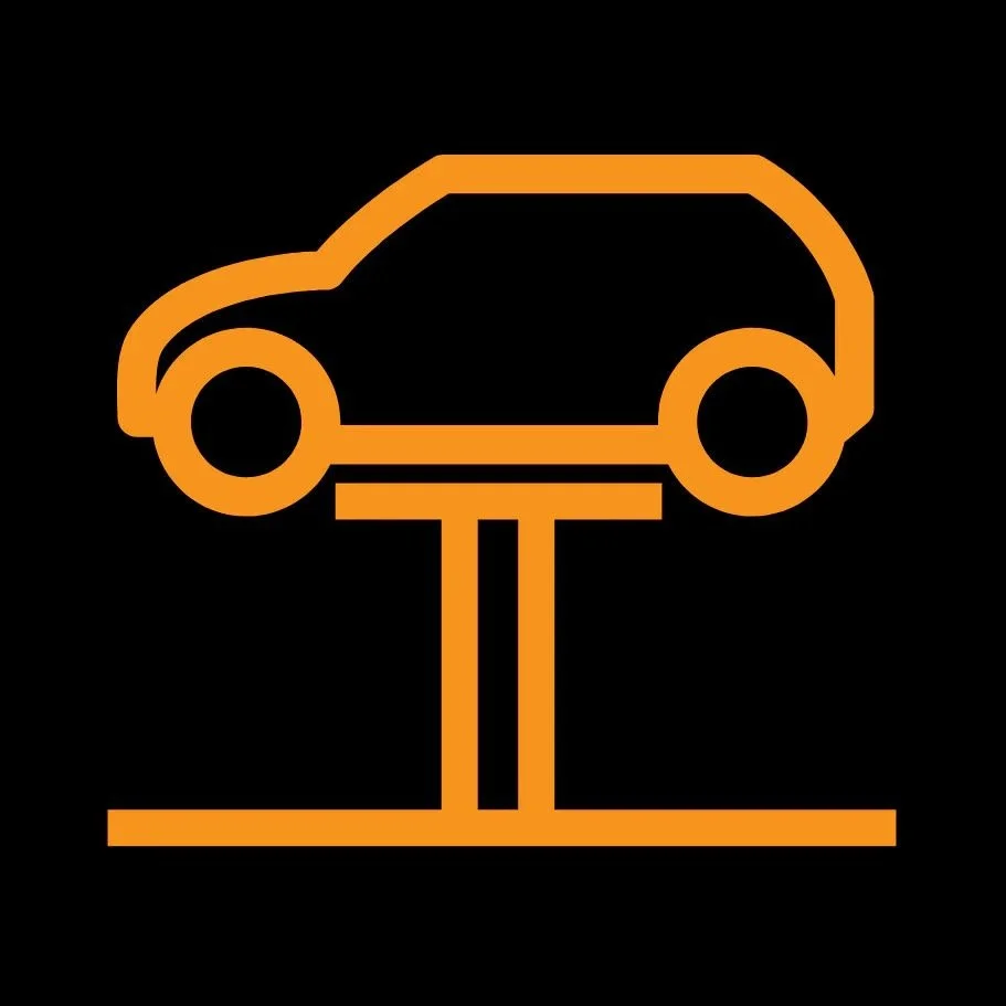 Icon of a car on a lift, depicted with orange lines on a black background.