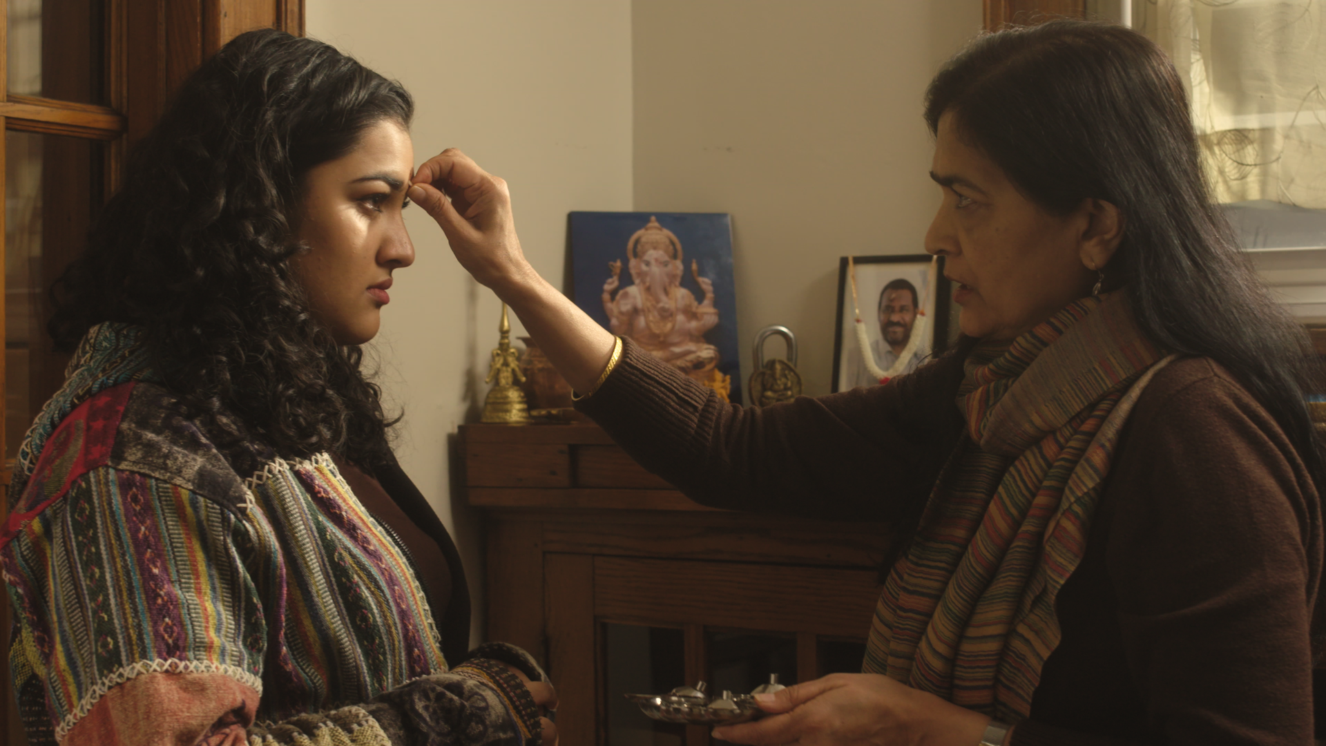 pooja still - 2 shot.png