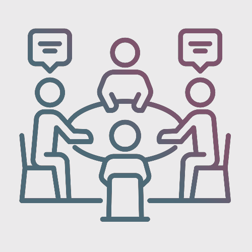 Line drawing of four people sitting around a round table, engaged in conversation, with speech bubbles above two of them.