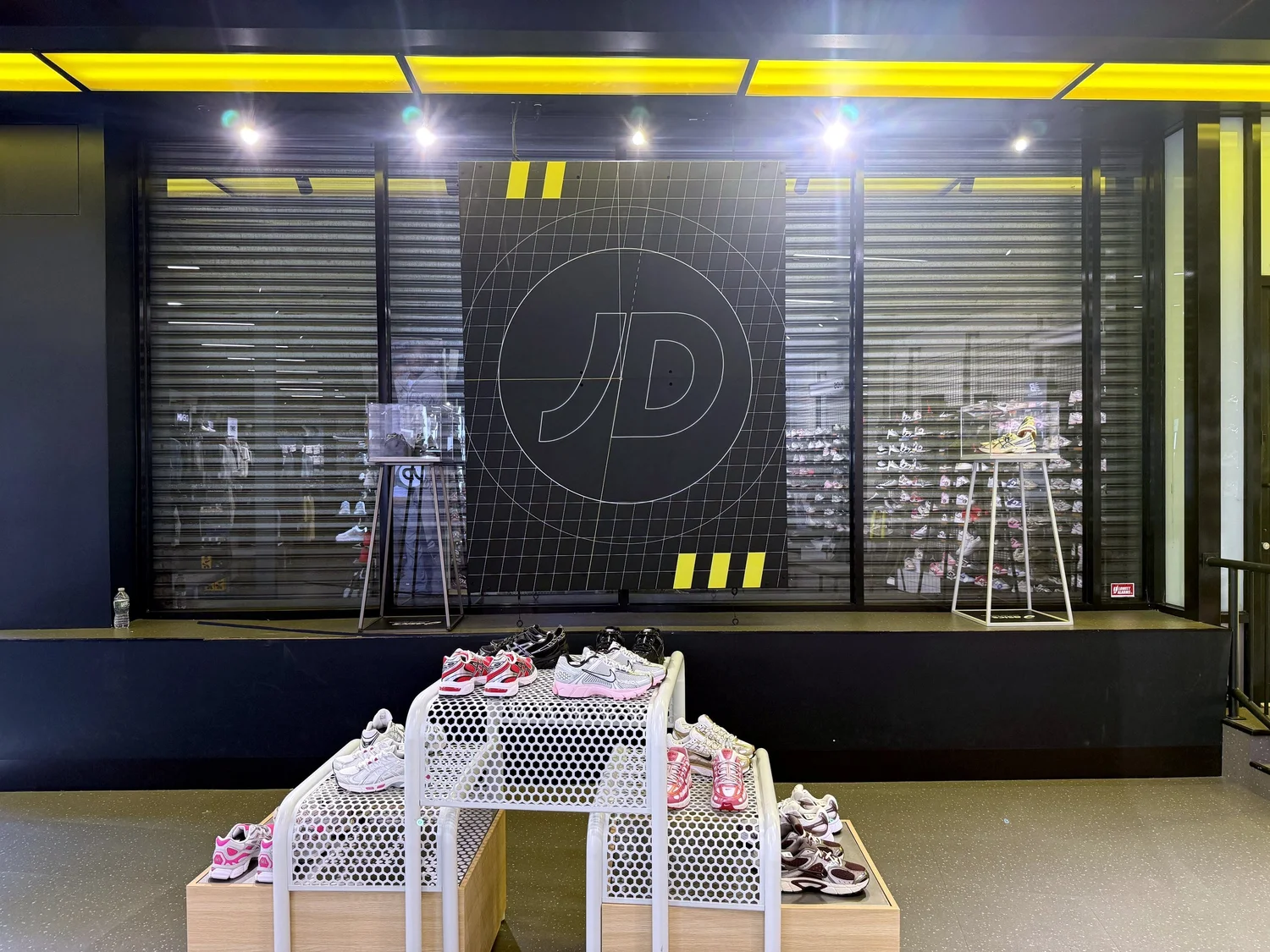 JD logo wall with display lighting