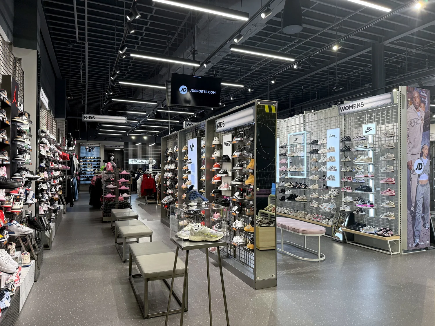 Footwear displays and track lighting