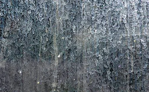 How Hard Water and Sprinklers Damage Your Windows Over Time
