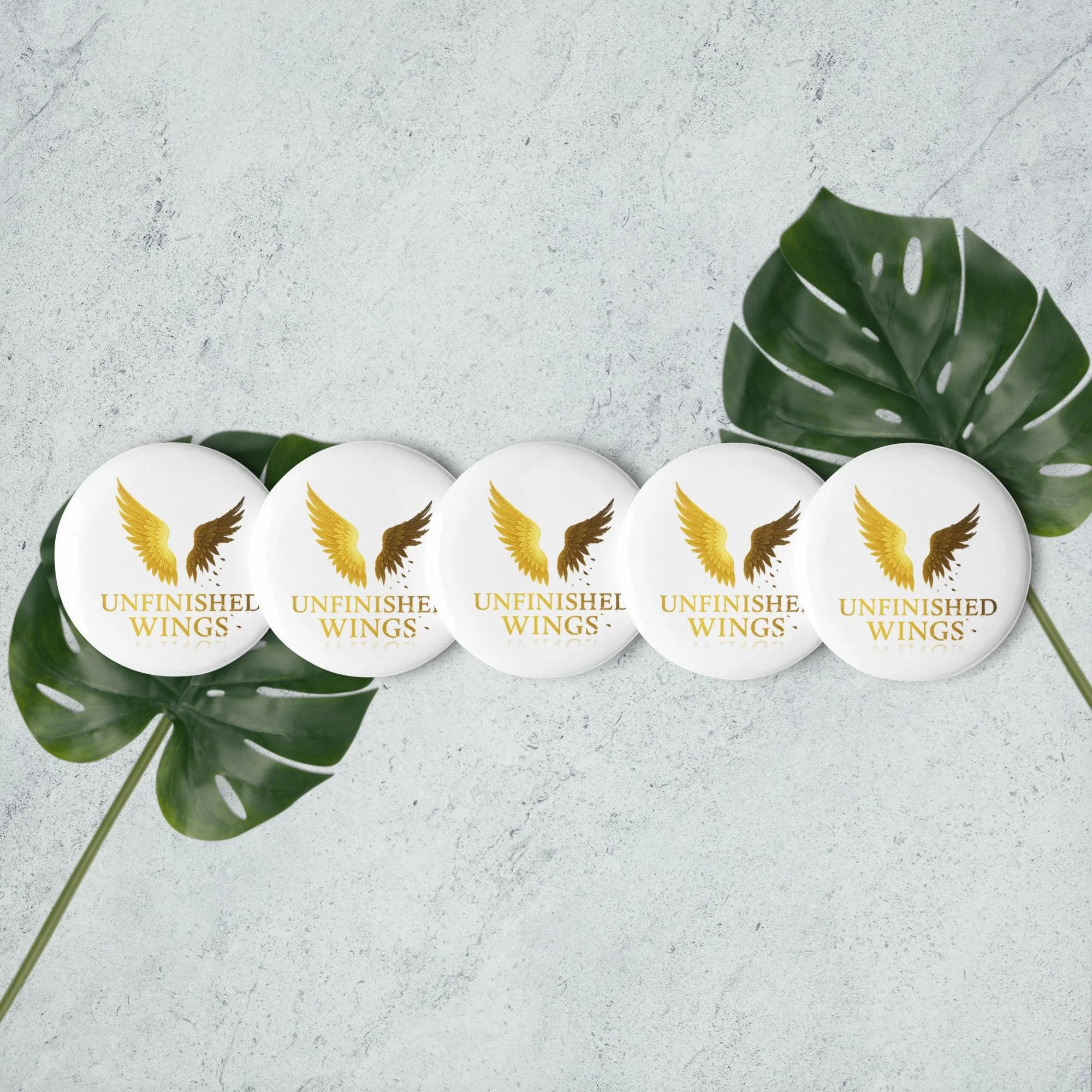 Set of pin Unfinished Wings buttons