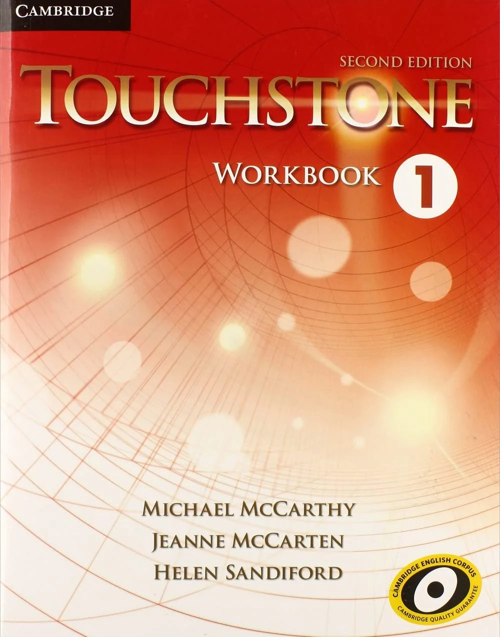 The cover of the book titled 'Touchstone Workbook 1, Second Edition' by Michael McCarthy, Jeanne McCarten, and Helen Sandiford, with a red background and abstract circular design.