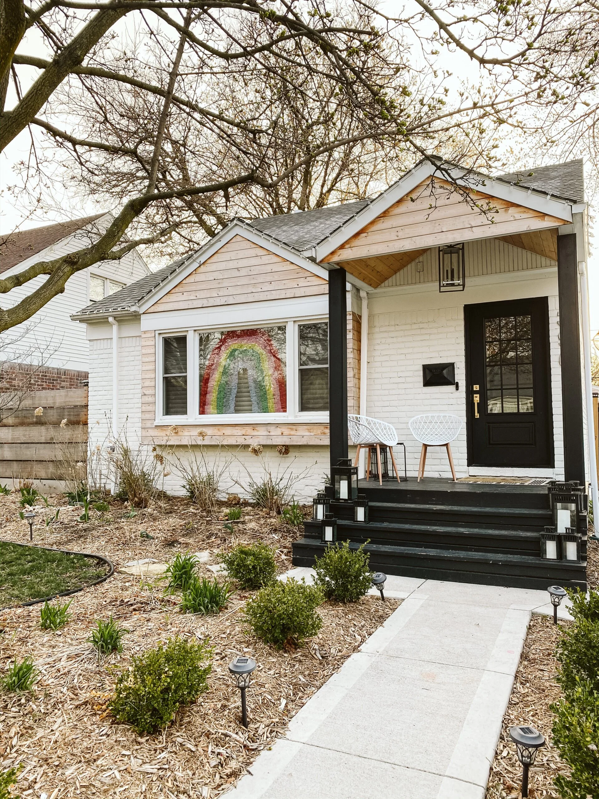 WHY WE PAINTED VS STAINED OUR FRONT PORCH