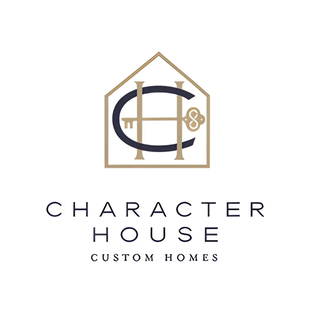 Logo for Character House Custom Homes featuring a house outline with a large C and H intertwined, accompanied by a key positioned on the right side of the letters, and the company name below.