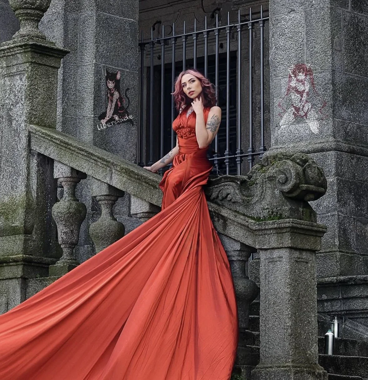 Cozumel photoshoot with model in red dress by old architecture