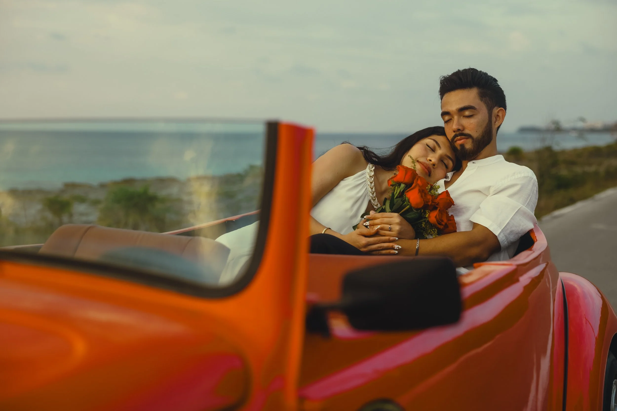 Cozumel wedding photography of couple posing in convertible