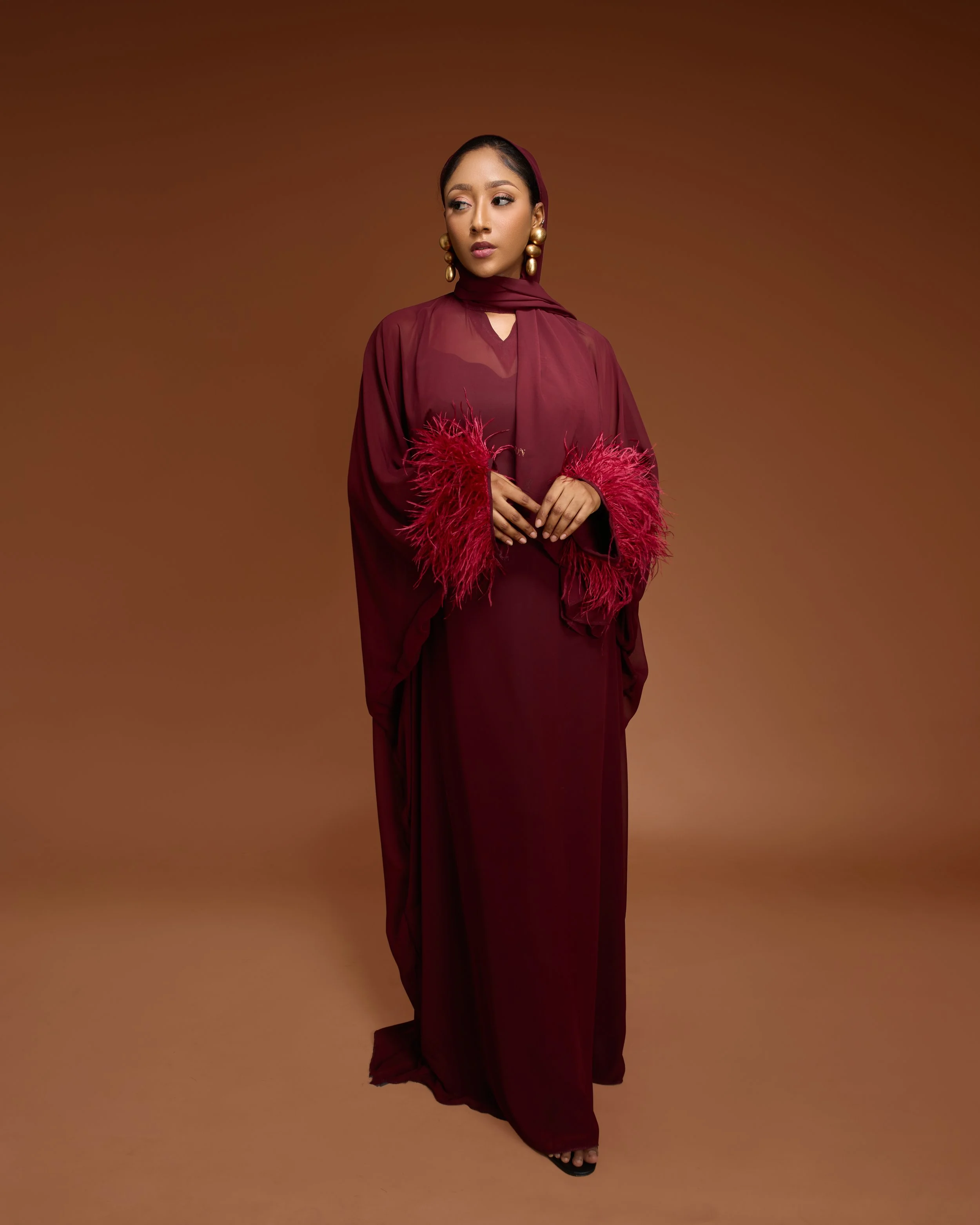 Lusari Feathered Elegance Dress. Satin abaya with sequin cuffs.