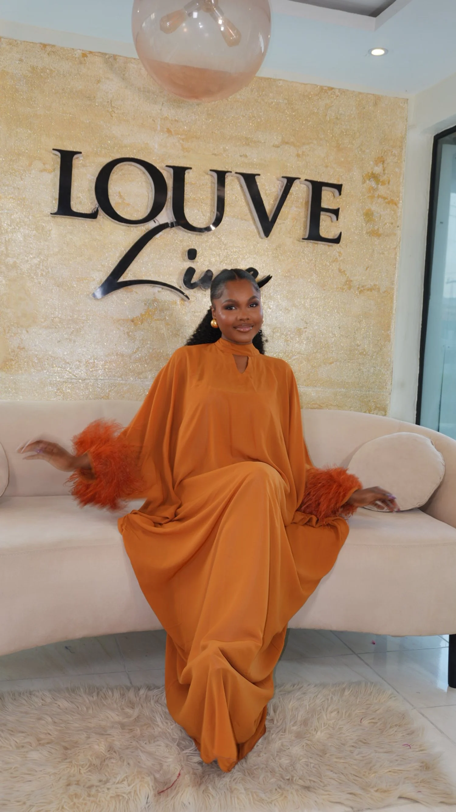 Lusari Feathered Elegance Gown in Burnt Orange