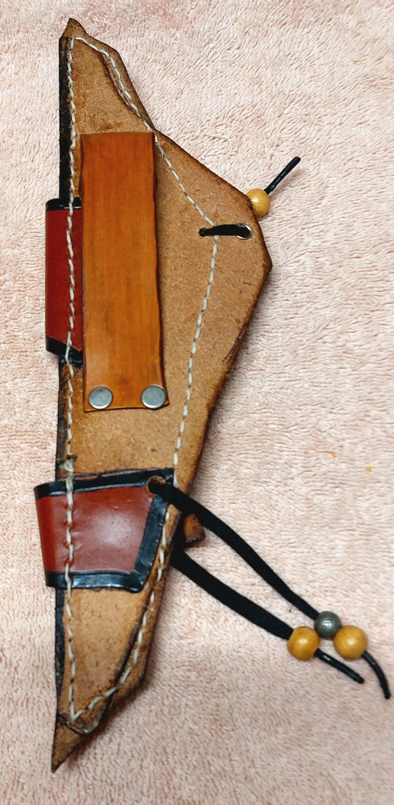 holster blk oval buttons wand set back.jpg