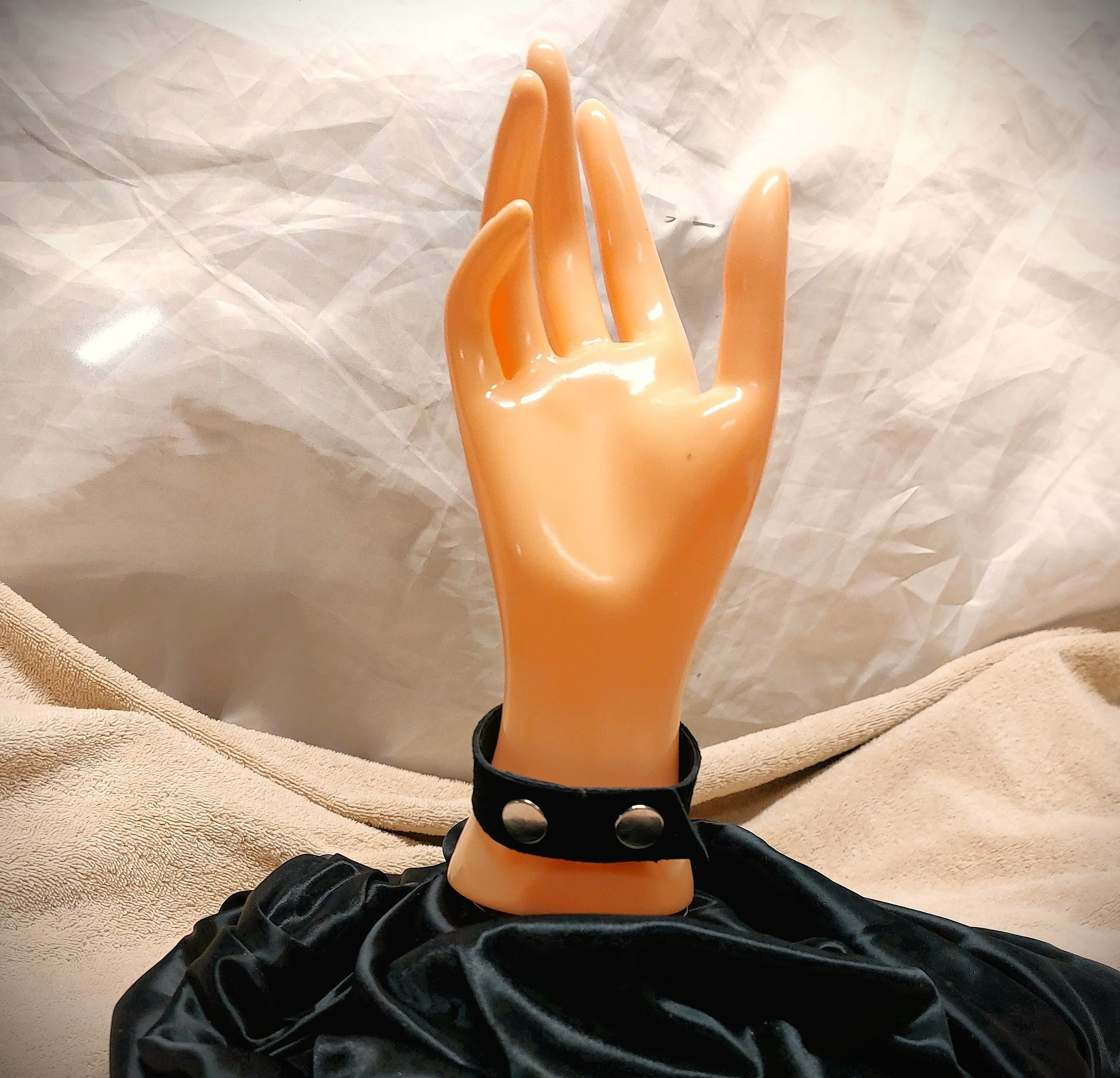 narr blk suede sw heart concho back on hand.jpg
