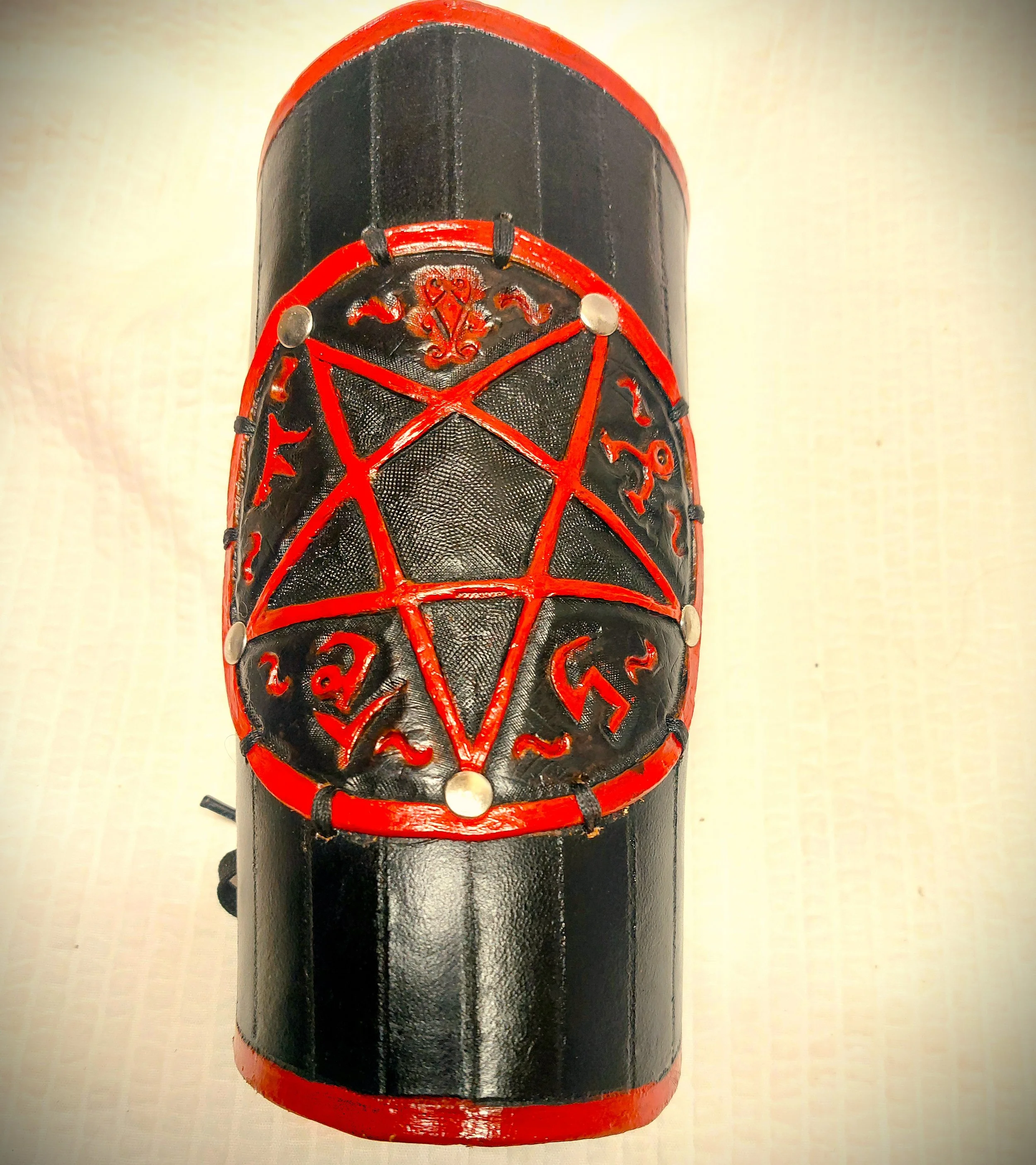blk n red hunter's bracer detail 1.jpg