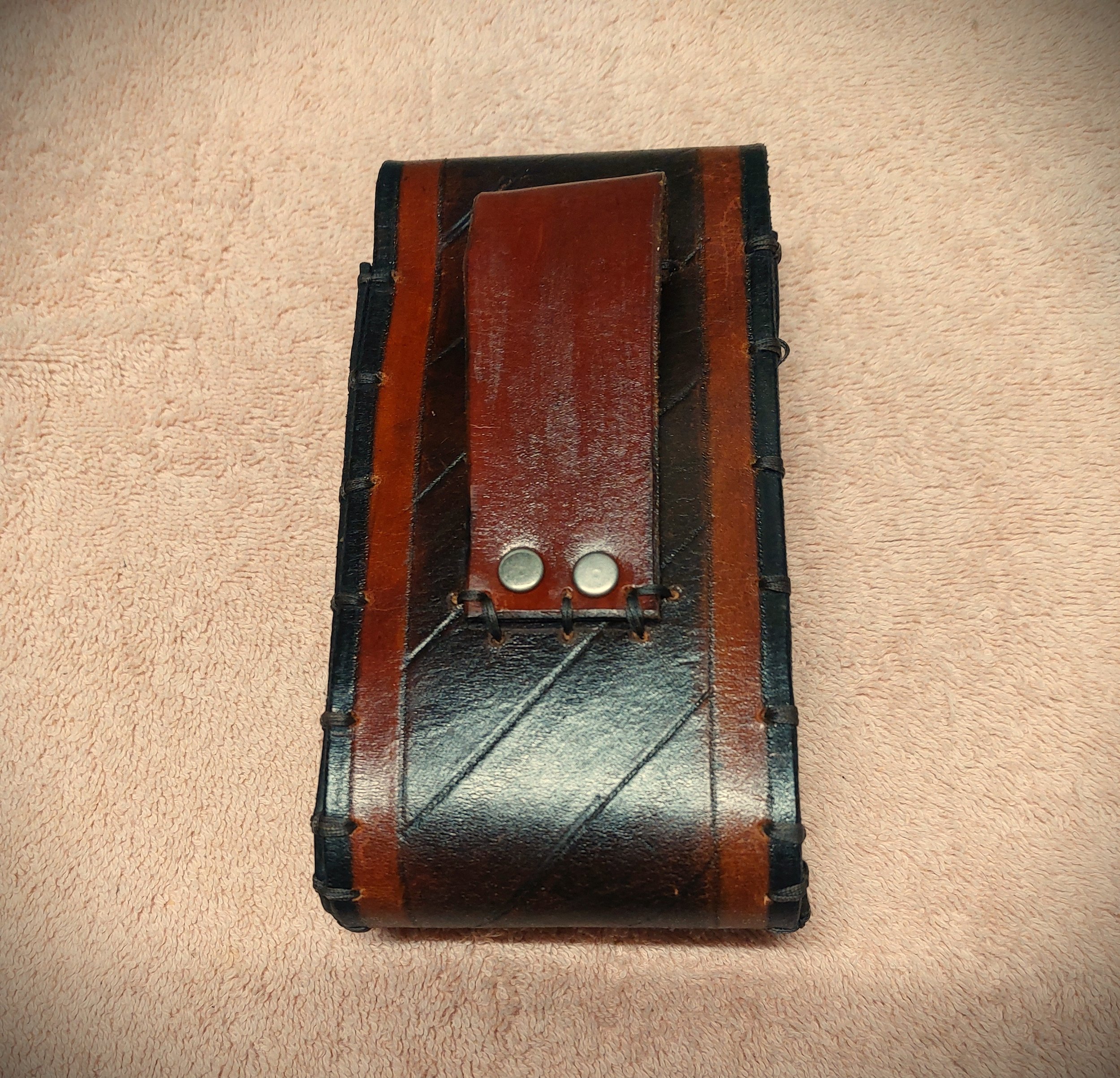 pouch cell phone medusa back detail.jpg