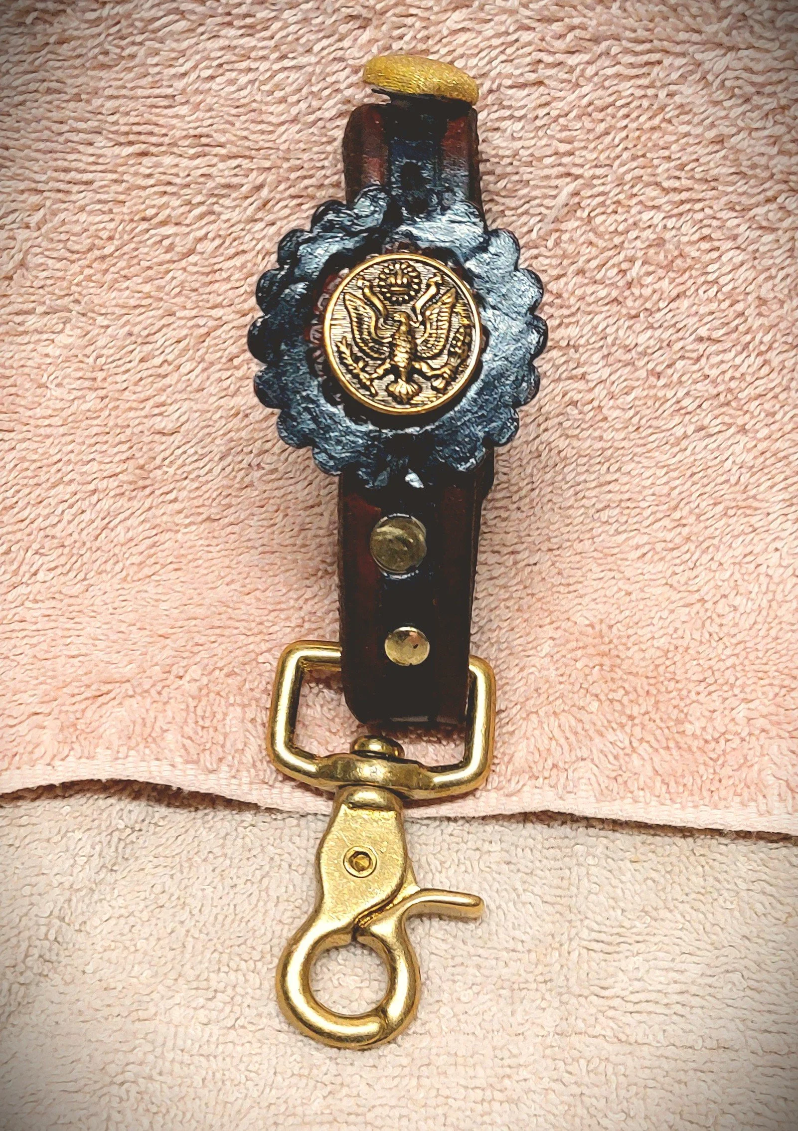 handcuffs eagle crest buttons detail 1.jpg