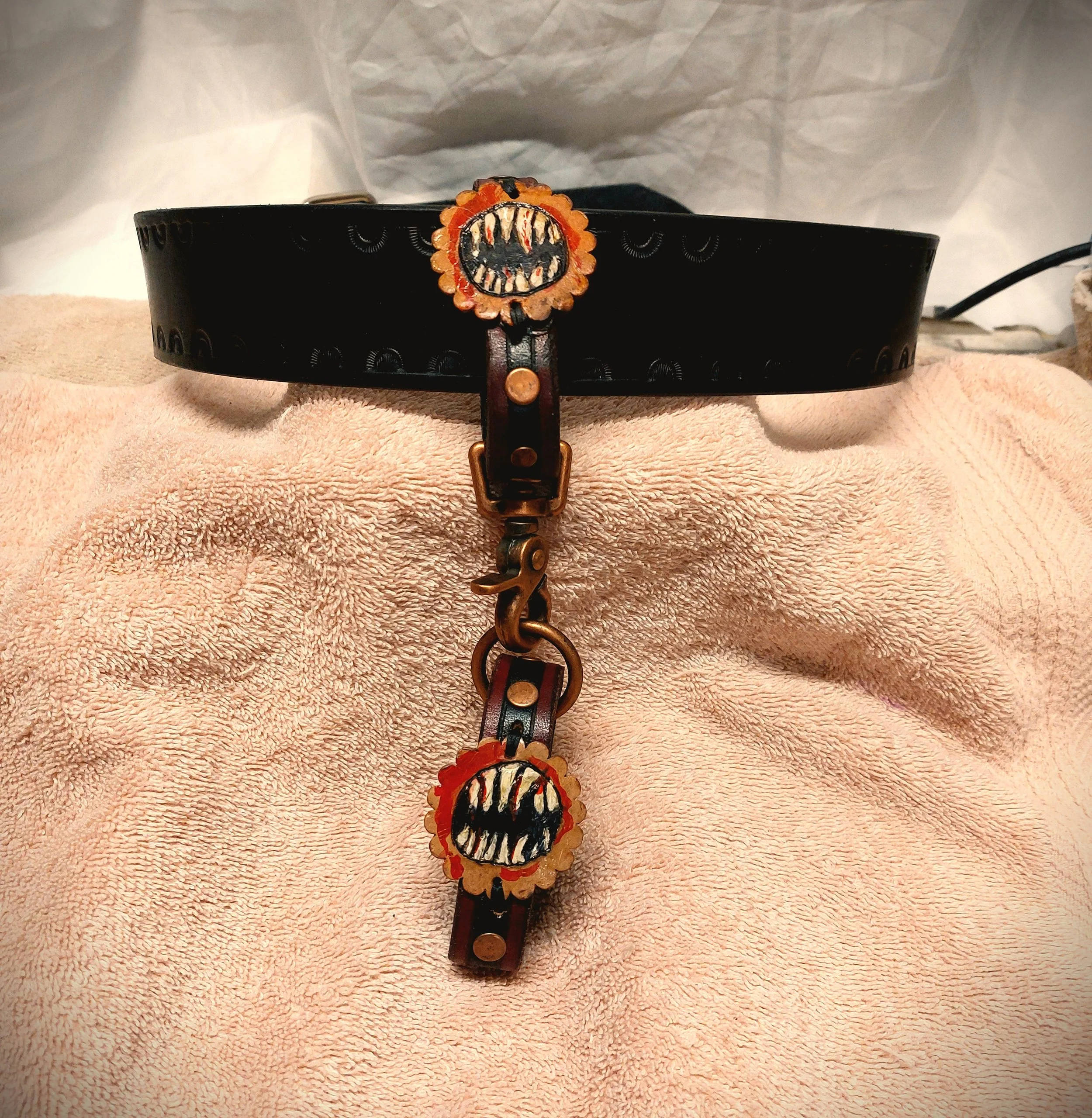 handcuffs Levi on leashed on belt.jpg