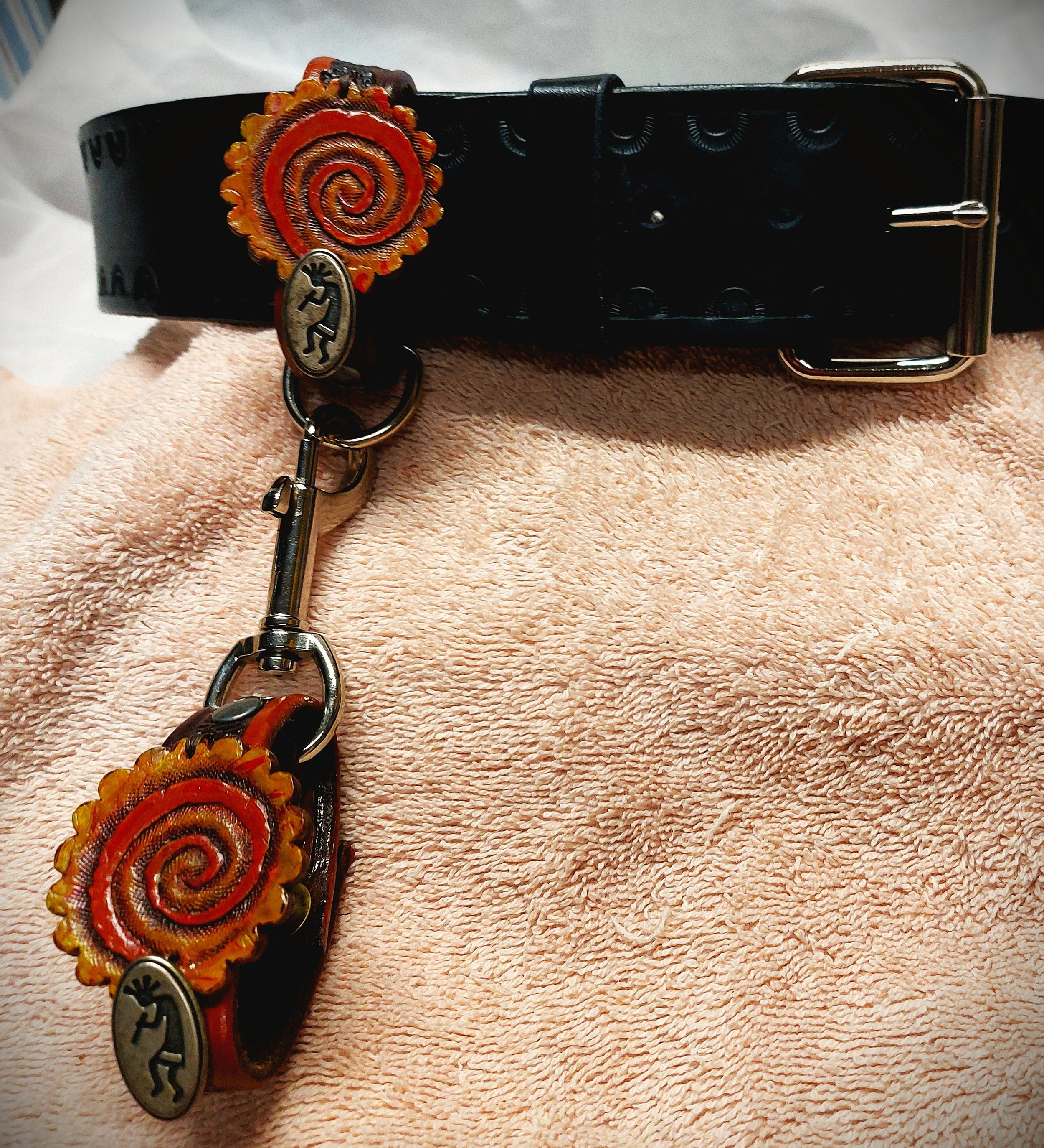 handcuffs kokopeli leashed out on belt.jpg