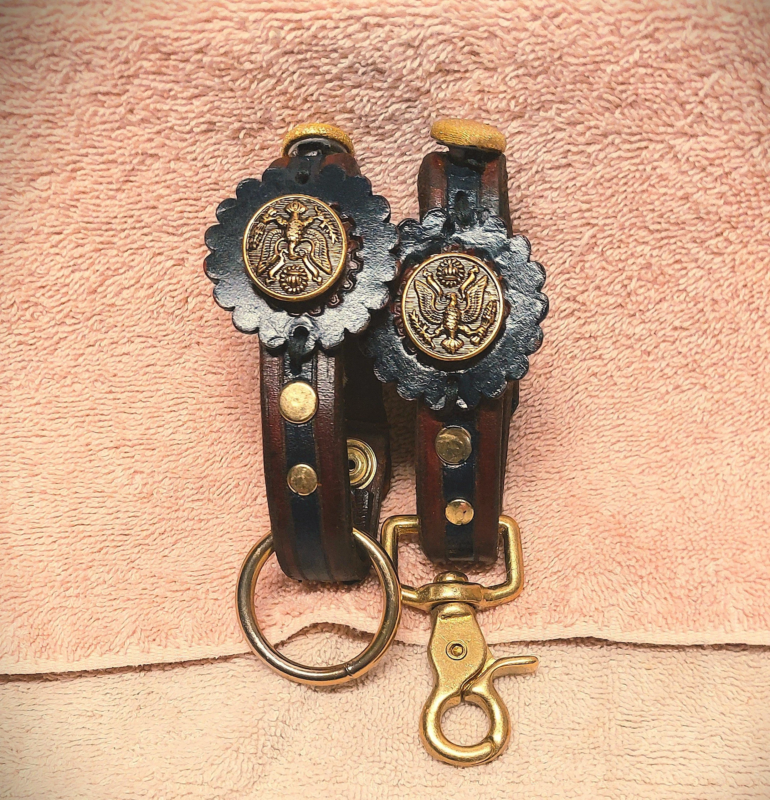 handcuffs eagle crest buttons side by side 1.jpg