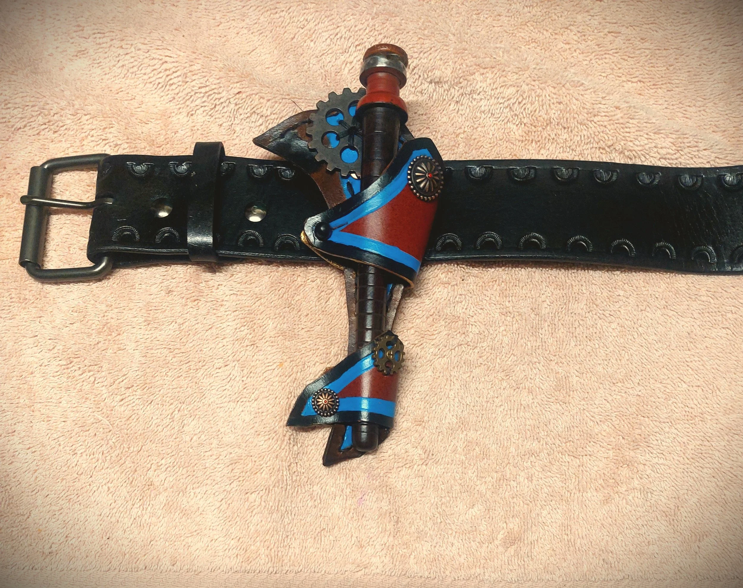 ss holster spicy blue and sm on belt.jpg