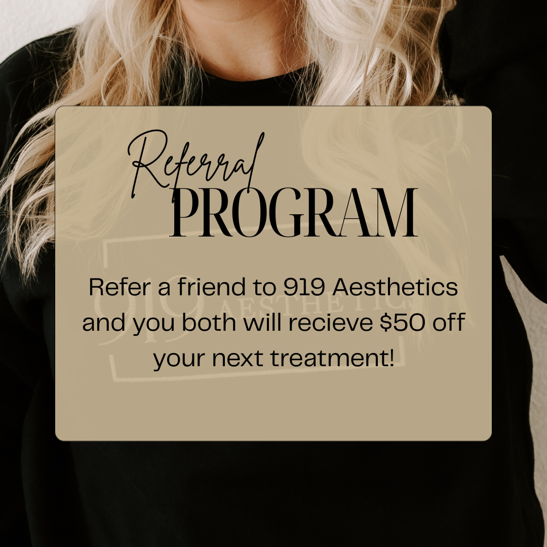 Text overlay on a photo of a woman with blonde hair, offering a referral program for 919 Aesthetics, providing $50 off a treatment when referring a friend.