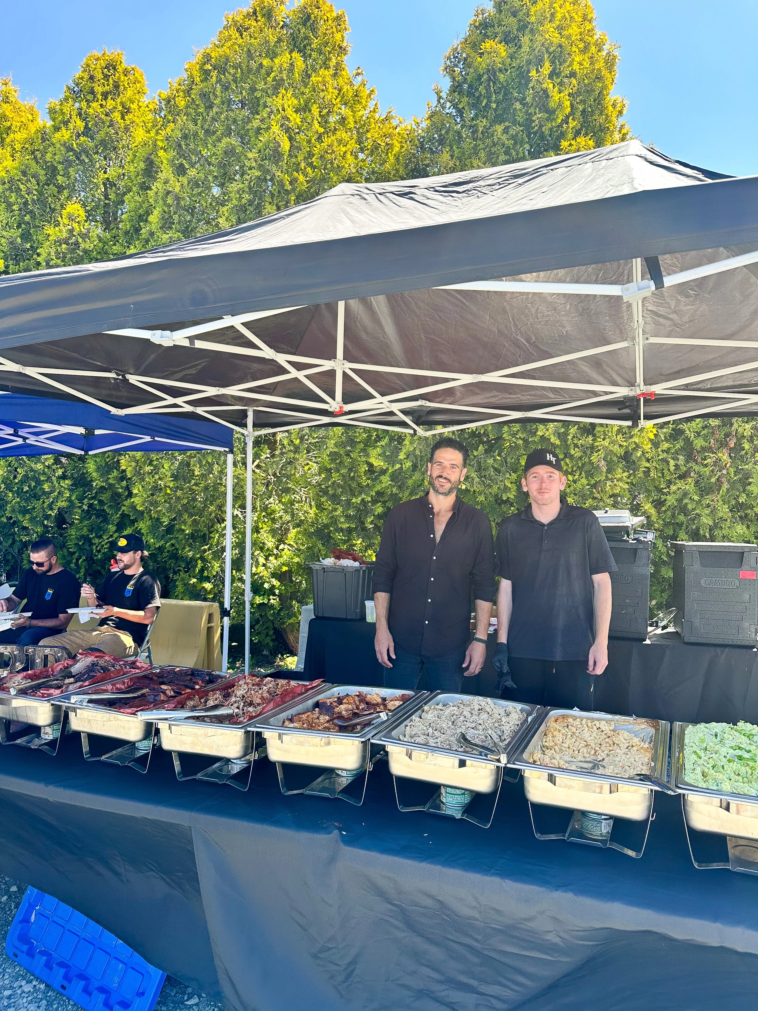 Pitmaster T and sous Chef Jerry Hughes Catering BBQ for a friends business appreciation day. 