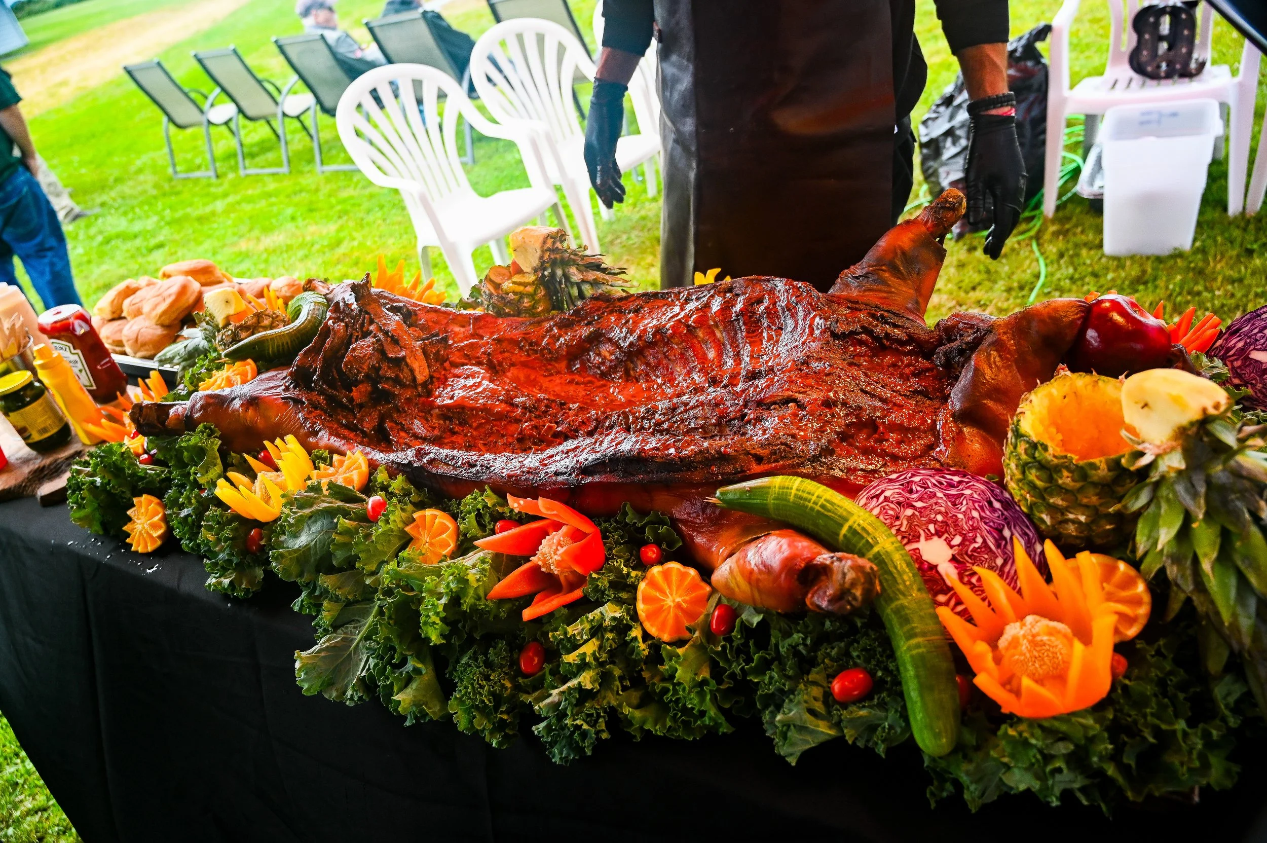 Site cooked whole hog catered 80th Birthday at the Delta air Park. southern BBQ catering at its best in delta BC 