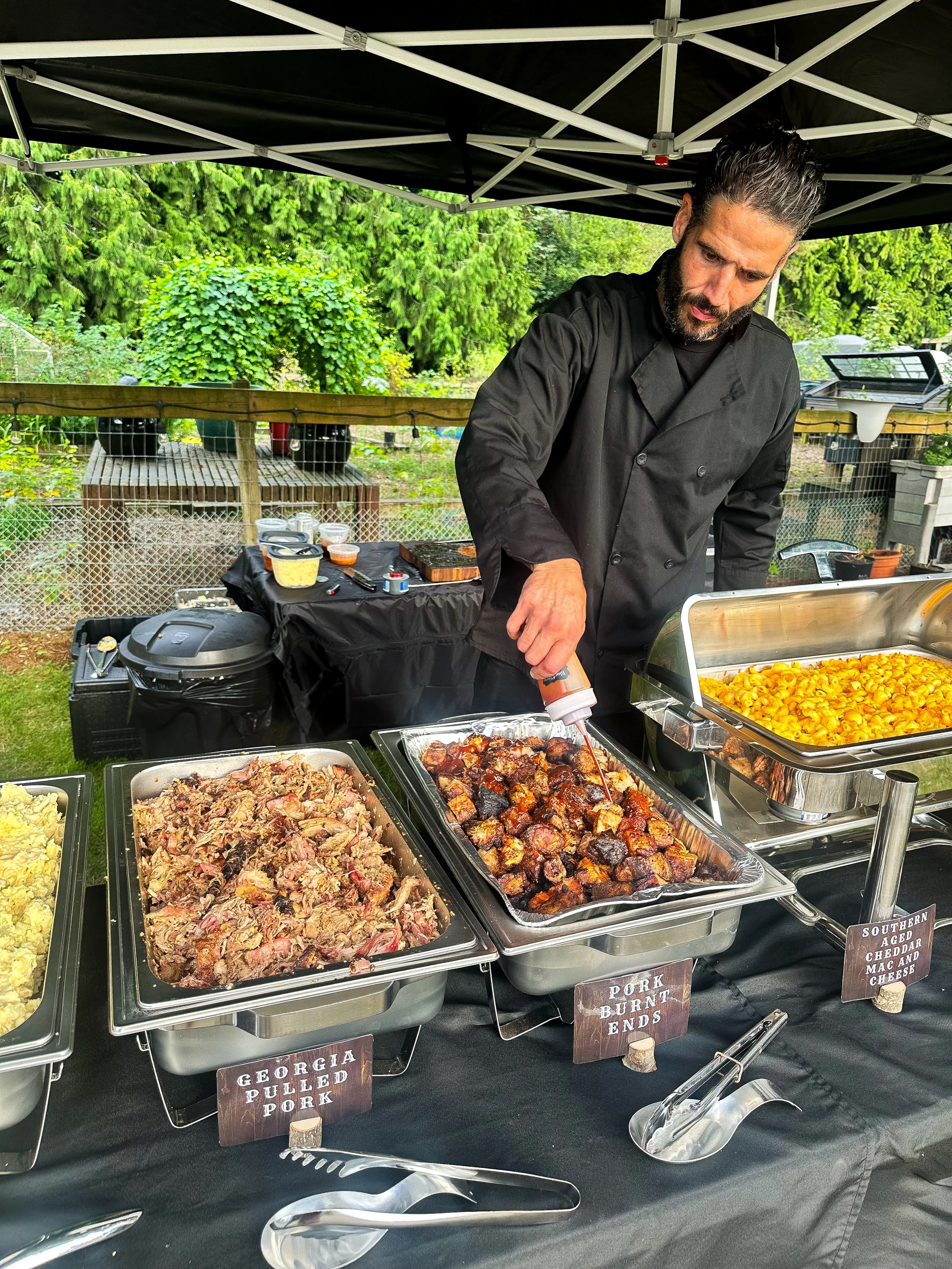it master T doing Pitmaster T things! getting the BBQ just perfect before catering Service! 