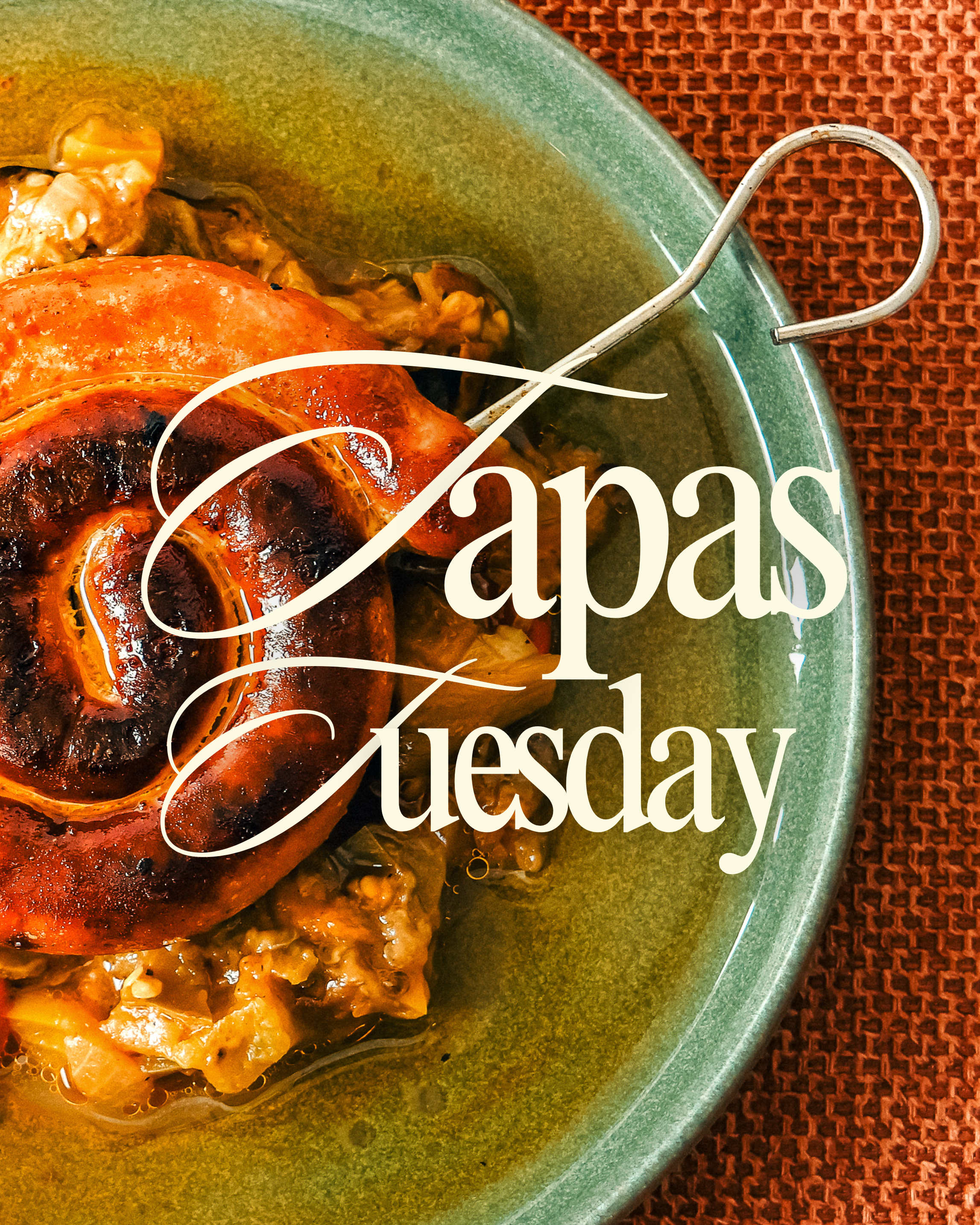 Close-up of a plate with a piece of grilled salmon and vegetables. The plate has a red textured background with a partial overlay of white cursive text that reads 'Turkey Tuesday'.