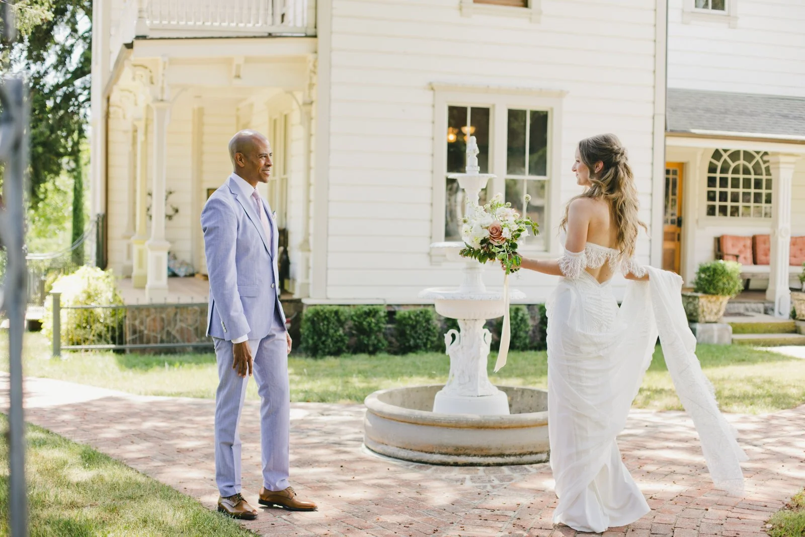 Bride and groom first look outside farmhouse at Triple S Ranch, Calistoga, California
