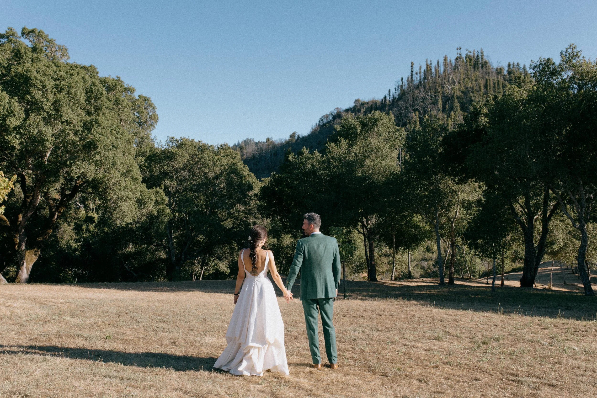 Bride and Groom in a beautiful field, at Triple S Ranch, wedding venue, Calistoga, California