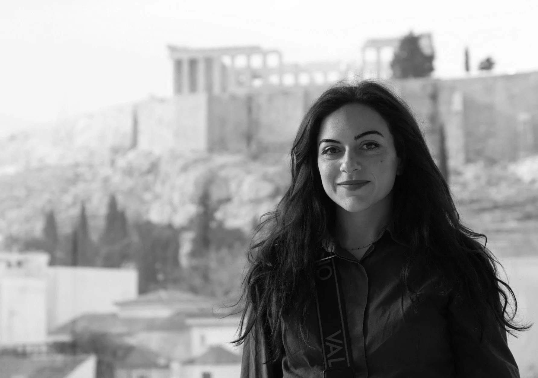 "A focused producer coordinating every detail on set, ensuring the production runs smoothly from start to finish."