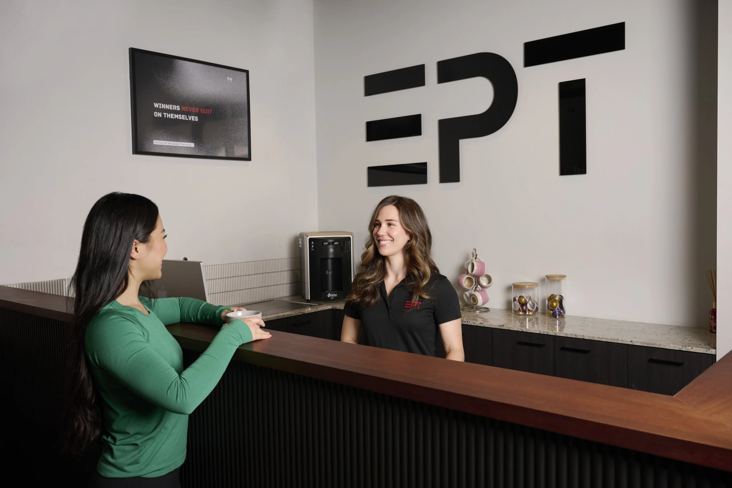 General Manager Ashleigh Elliott Smiling Before Meeting a New Client