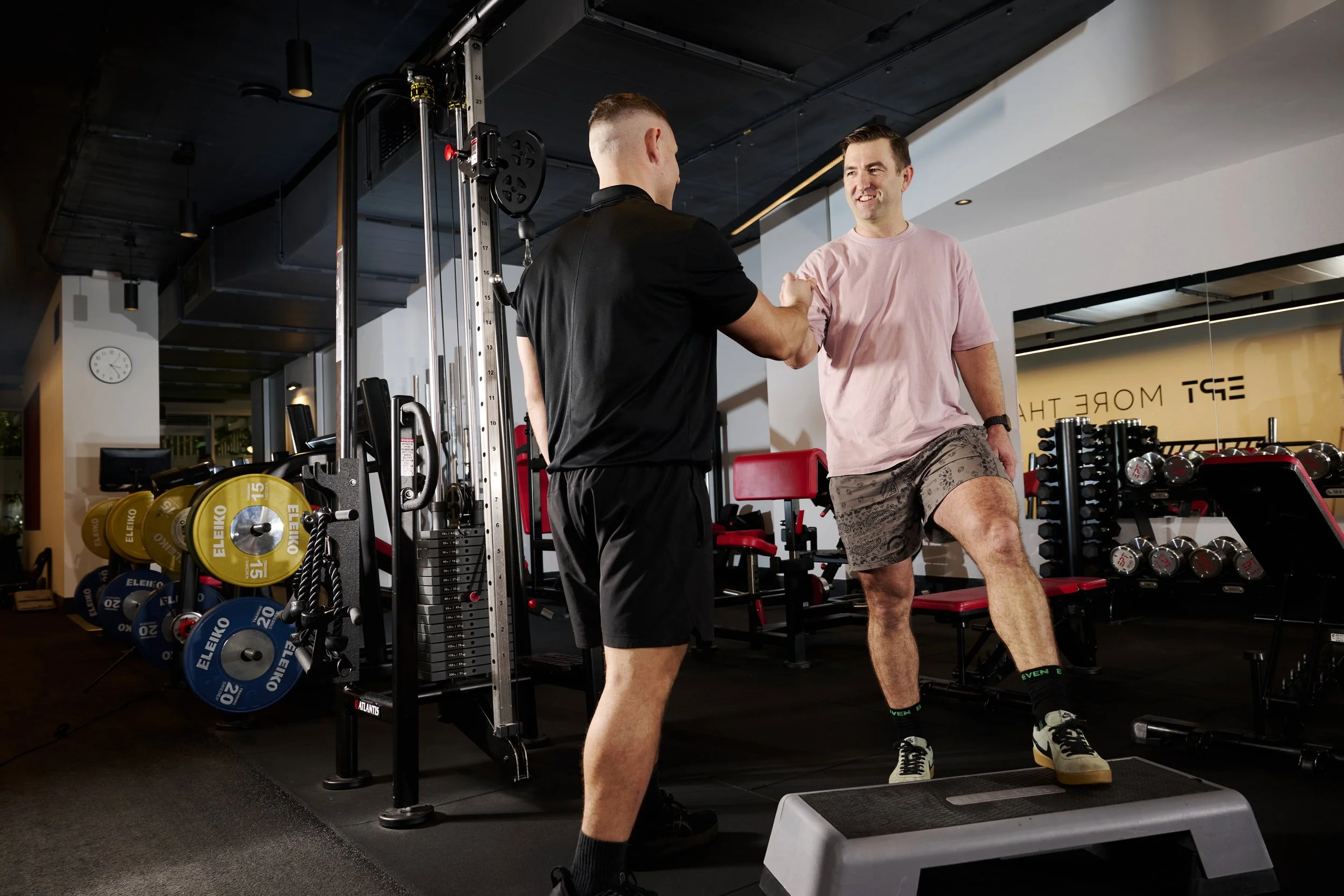 EPT Personal Trainer fist bumping his client after a great set