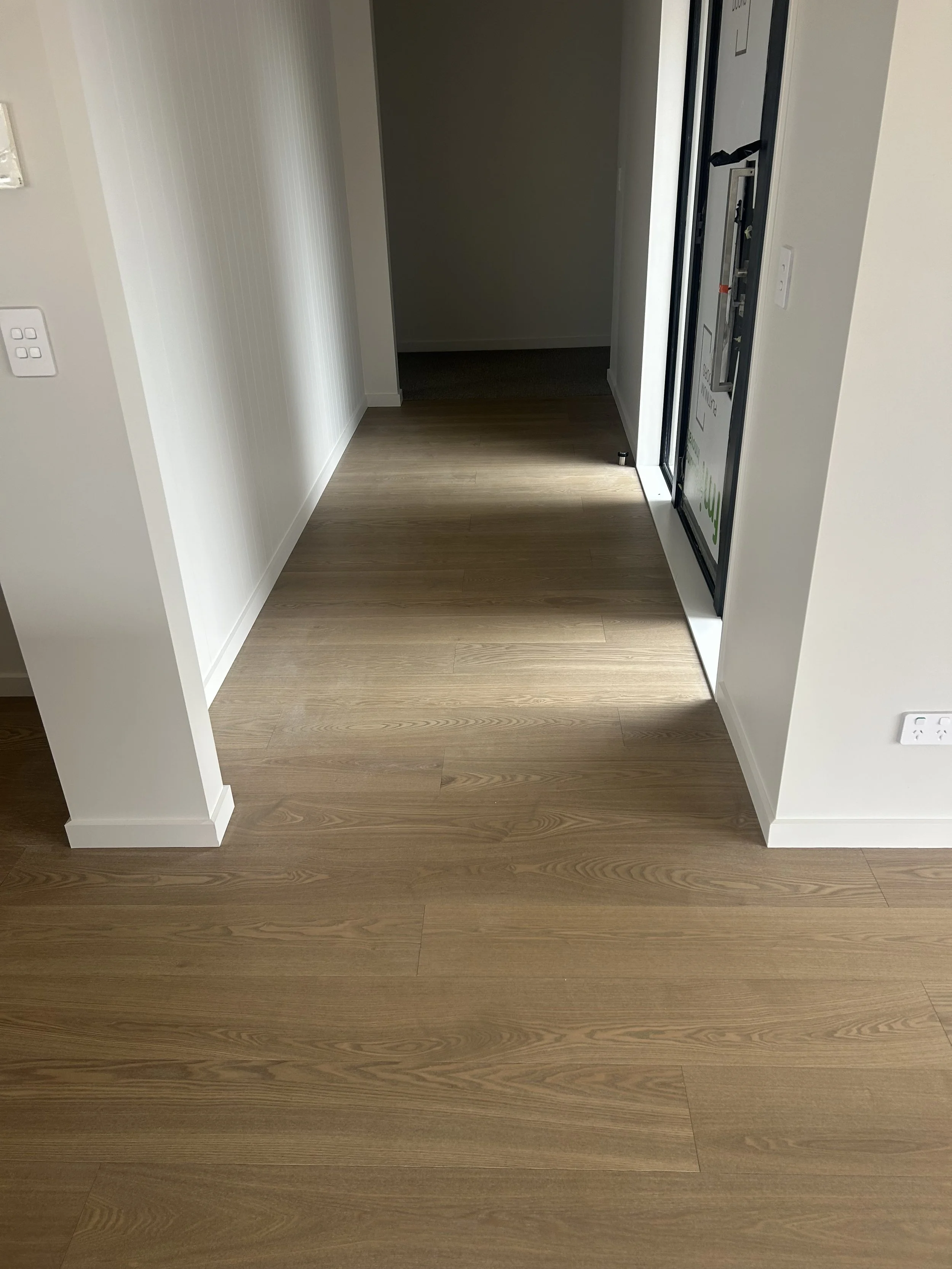 Dusky Ash in hallway with white walls