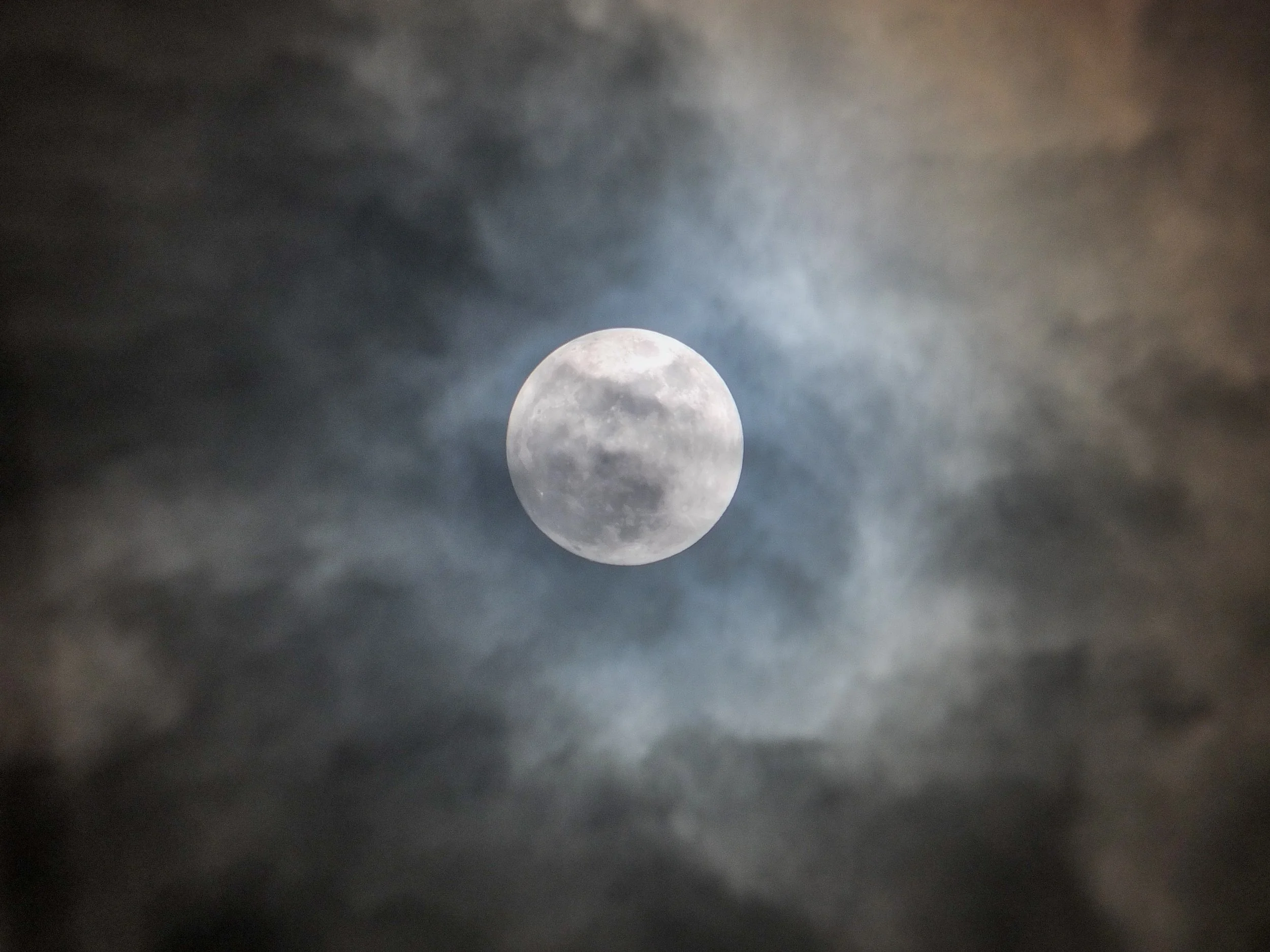 The moon in clouds