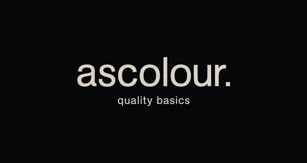 Black background with the word 'ascolour.' in large gray letters and the phrase 'quality basics' underneath.